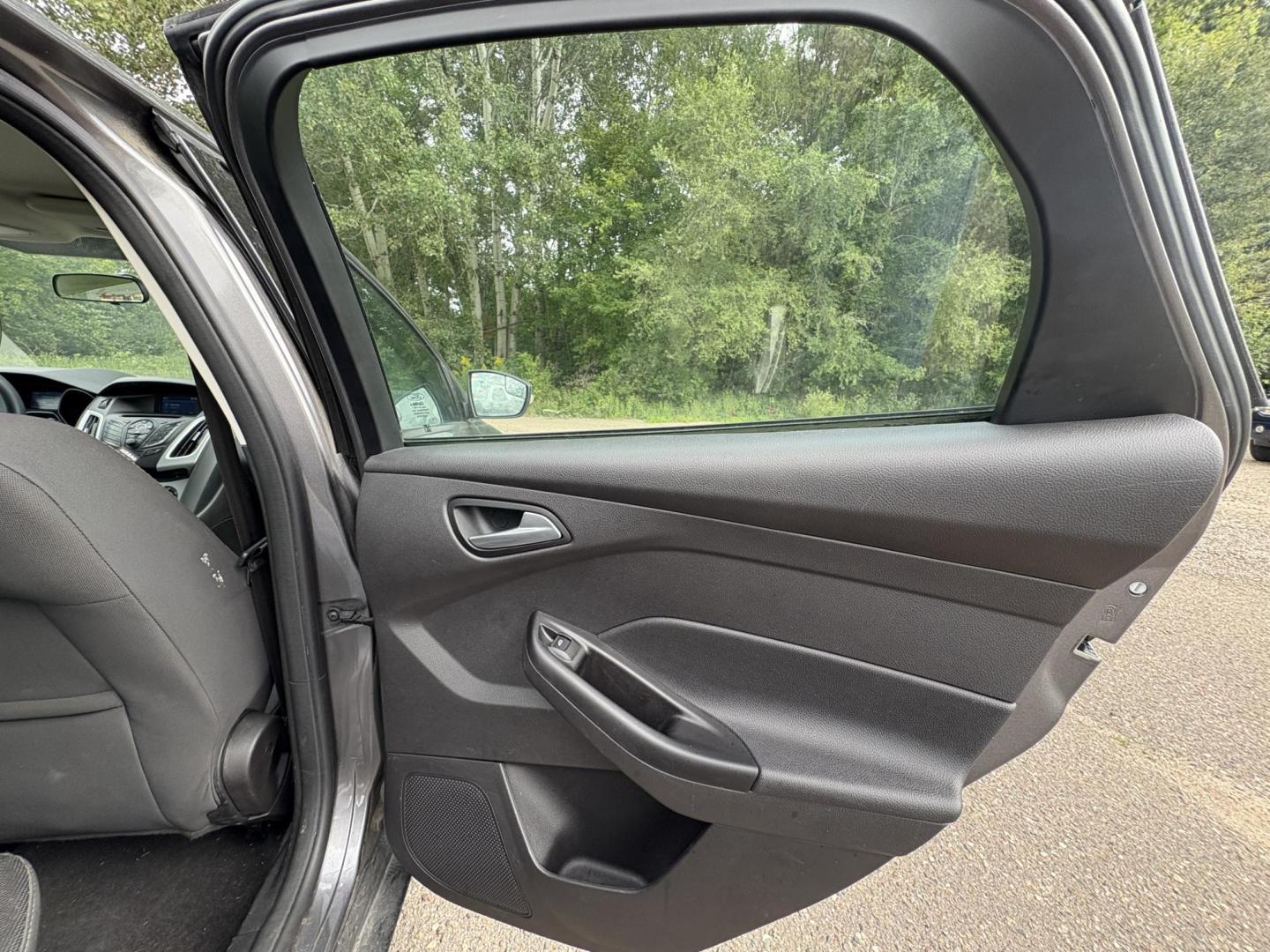 2014 Ford Focus SE Sedan (1FADP3F26EL) with an 2.0L L4 DOHC 16V engine, located at 17255 hwy 65 NE, Ham Lake, MN, 55304, 0.000000, 0.000000 - Photo#12