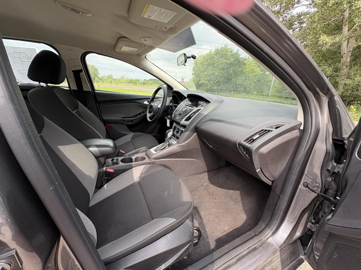 2014 Ford Focus SE Sedan (1FADP3F26EL) with an 2.0L L4 DOHC 16V engine, located at 17255 hwy 65 NE, Ham Lake, MN, 55304, 0.000000, 0.000000 - Photo#15