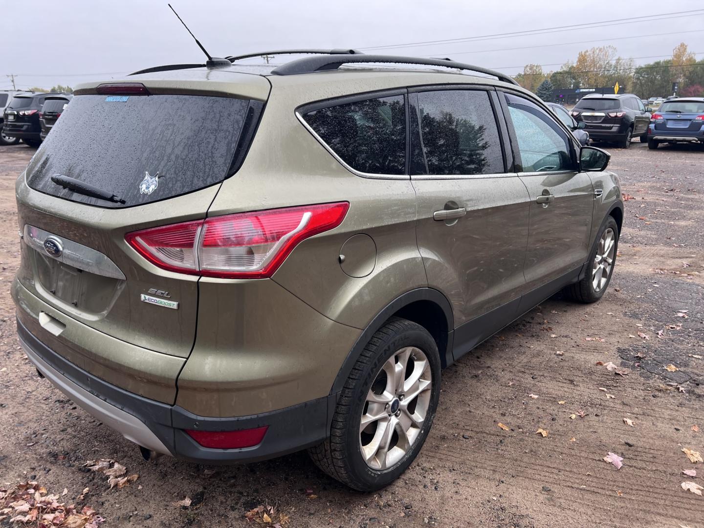 2013 Ford Escape SEL FWD (1FMCU0H90DU) with an 2.0L L4 DOHC 16V engine, 6-Speed Automatic transmission, located at 17255 hwy 65 NE, Ham Lake, MN, 55304, 0.000000, 0.000000- Photo#4