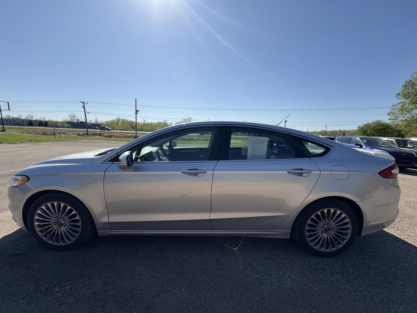 2014 Ford Fusion Titanium (3FA6P0K97ER) with an 2.0L L4 DOHC 16V engine, located at 17255 hwy 65 NE, Ham Lake, MN, 55304, 0.000000, 0.000000 - Photo#1