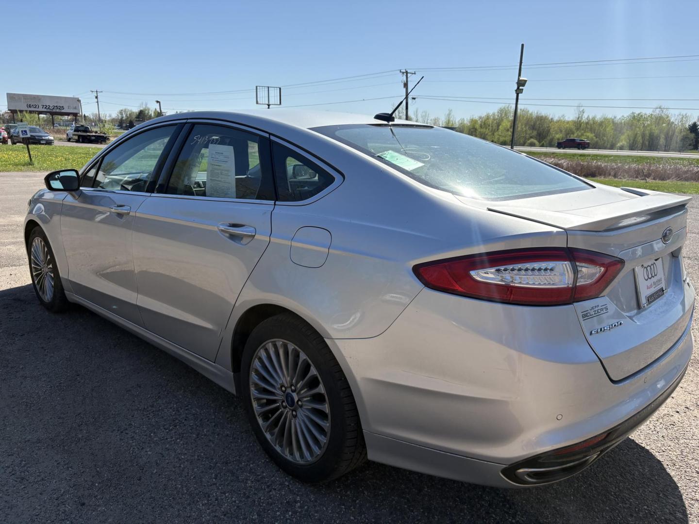2014 Ford Fusion Titanium (3FA6P0K97ER) with an 2.0L L4 DOHC 16V engine, located at 17255 hwy 65 NE, Ham Lake, MN, 55304, 0.000000, 0.000000 - Photo#2