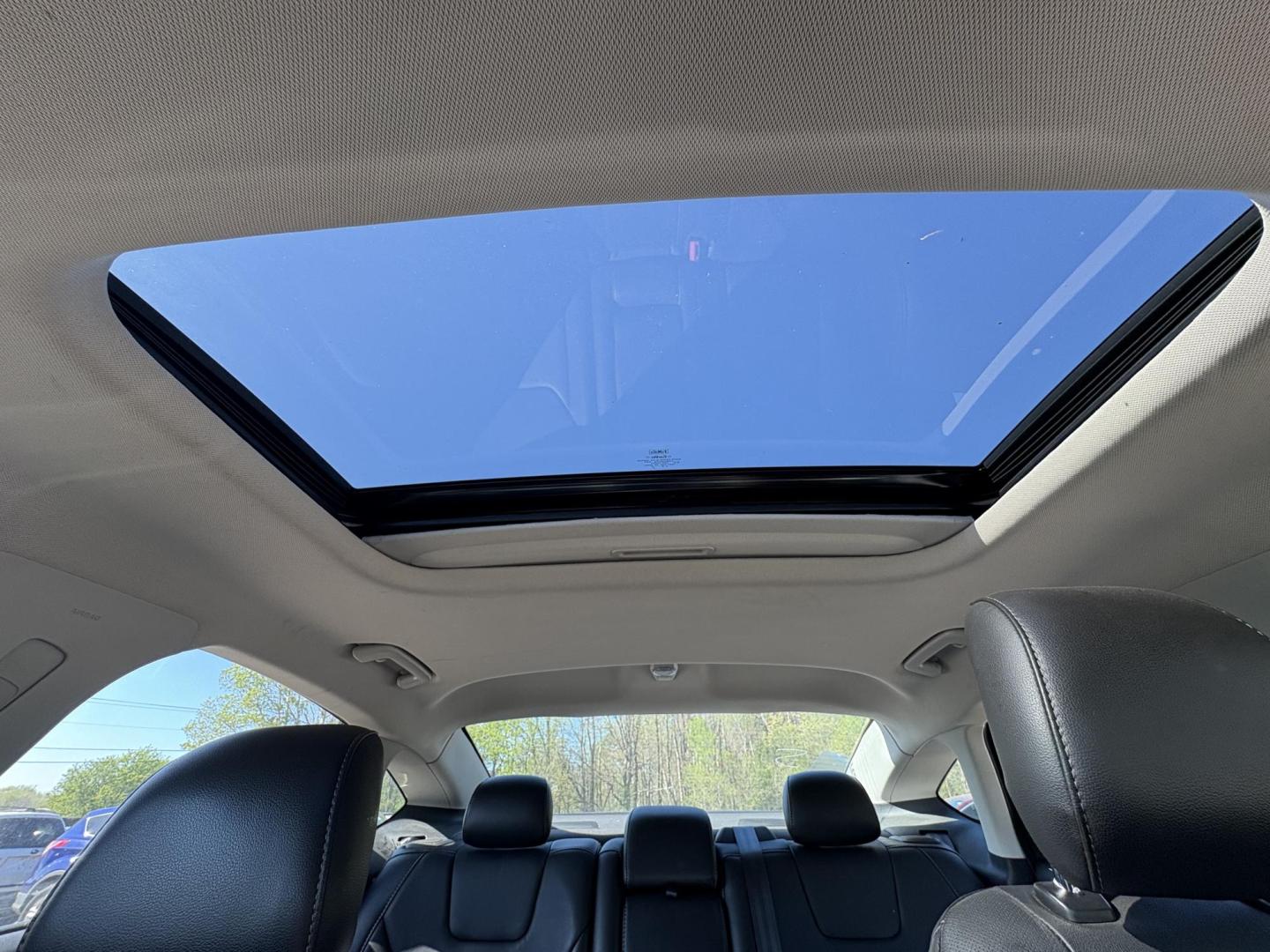 2014 Ford Fusion Titanium (3FA6P0K97ER) with an 2.0L L4 DOHC 16V engine, located at 17255 hwy 65 NE, Ham Lake, MN, 55304, 0.000000, 0.000000 - Photo#16