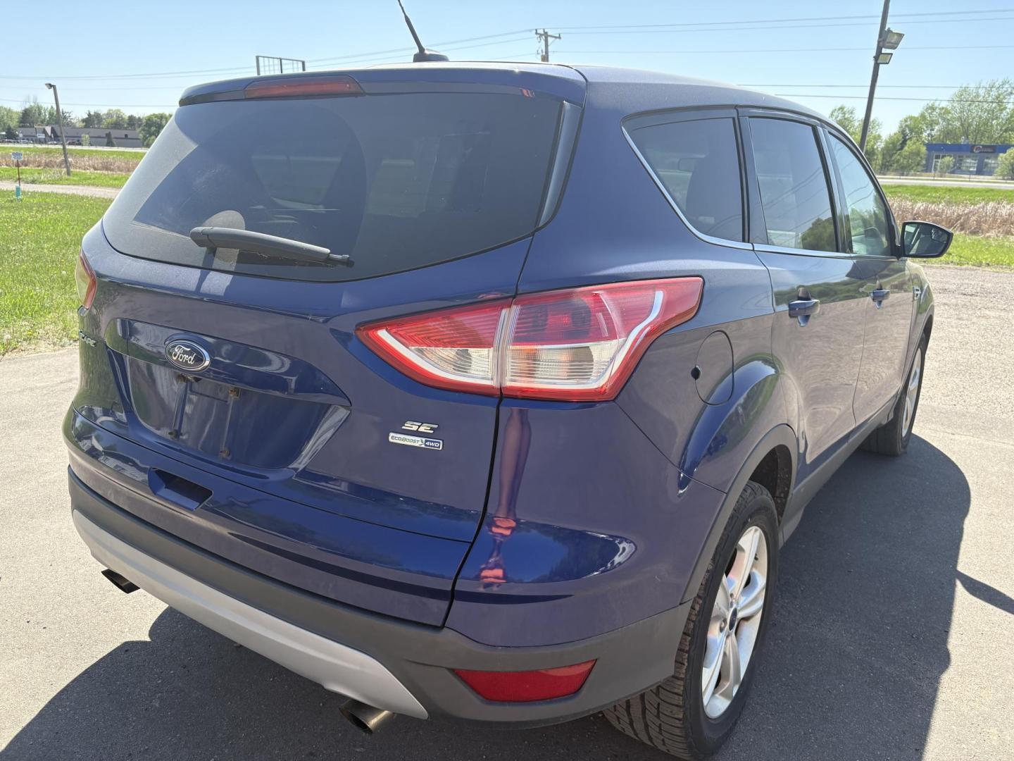 2014 Ford Escape SE 4WD (1FMCU9GX8EU) with an 1.6L L4 DOHC 16V engine, 6-Speed Automatic transmission, located at 17255 hwy 65 NE, Ham Lake, MN, 55304, 0.000000, 0.000000 - Photo#4
