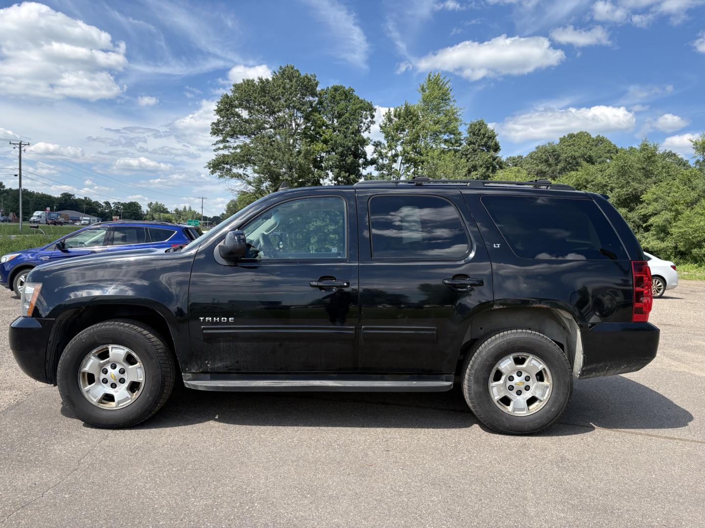 2011 Chevrolet Tahoe LT 4WD (1GNSKBE0XBR) with an 5.3L V8 OHV 16V FFV engine, 6-Speed Automatic transmission, located at 17255 hwy 65 NE, Ham Lake, MN, 55304, 0.000000, 0.000000- Photo#1