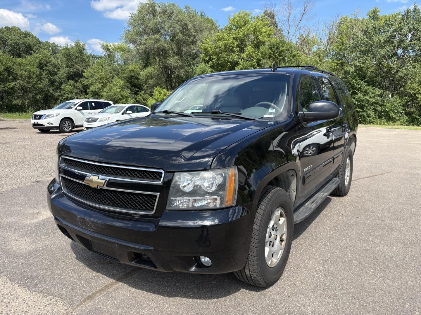 2011 Chevrolet Tahoe LT 4WD (1GNSKBE0XBR) with an 5.3L V8 OHV 16V FFV engine, 6-Speed Automatic transmission, located at 17255 hwy 65 NE, Ham Lake, MN, 55304, 0.000000, 0.000000- Photo#0