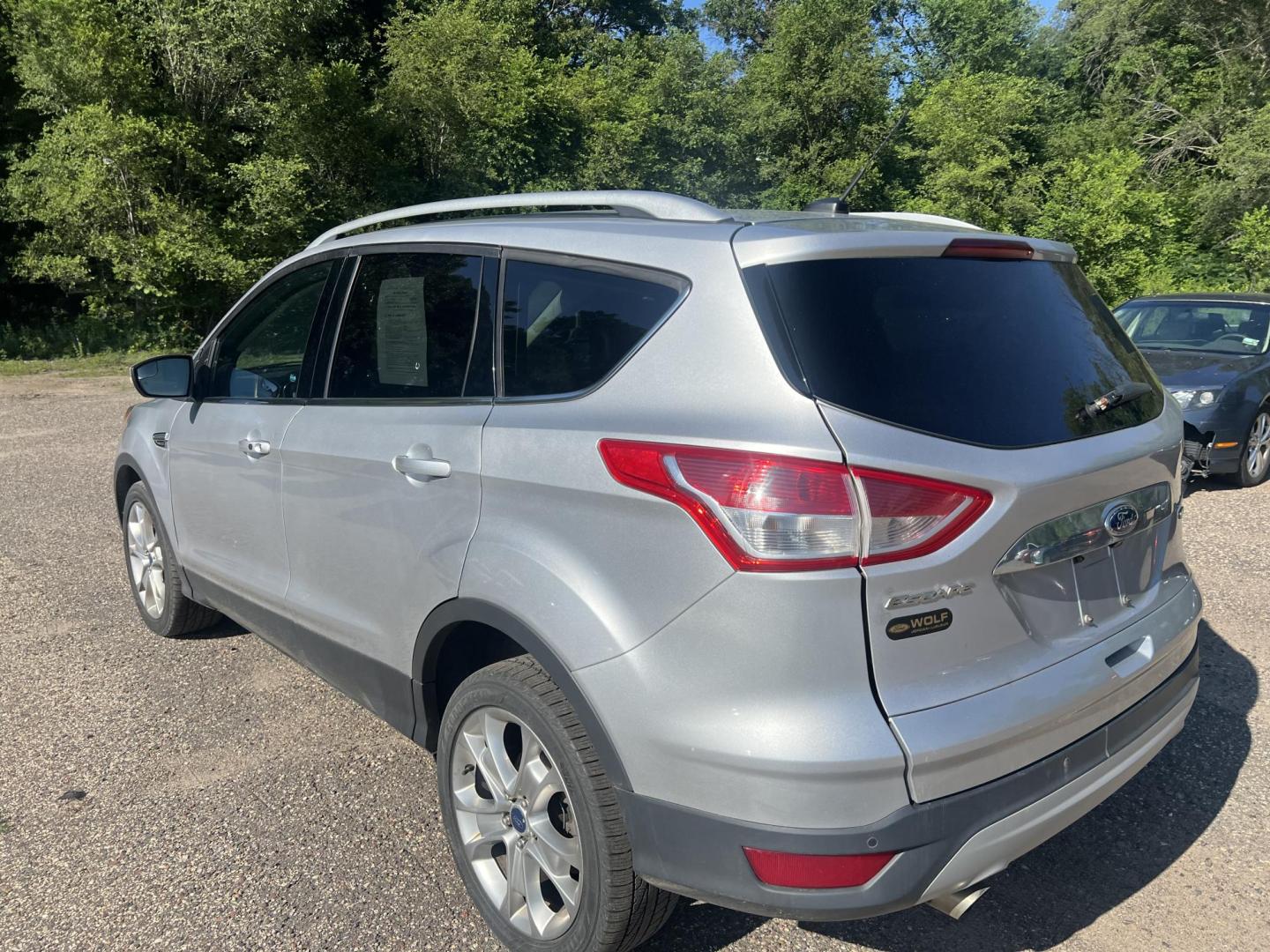 2015 Ford Escape Titanium 4WD (1FMCU9J94FU) with an 2.0L L4 DOHC 16V engine, 6-Speed Automatic transmission, located at 17255 hwy 65 NE, Ham Lake, MN, 55304, 0.000000, 0.000000 - Photo#2