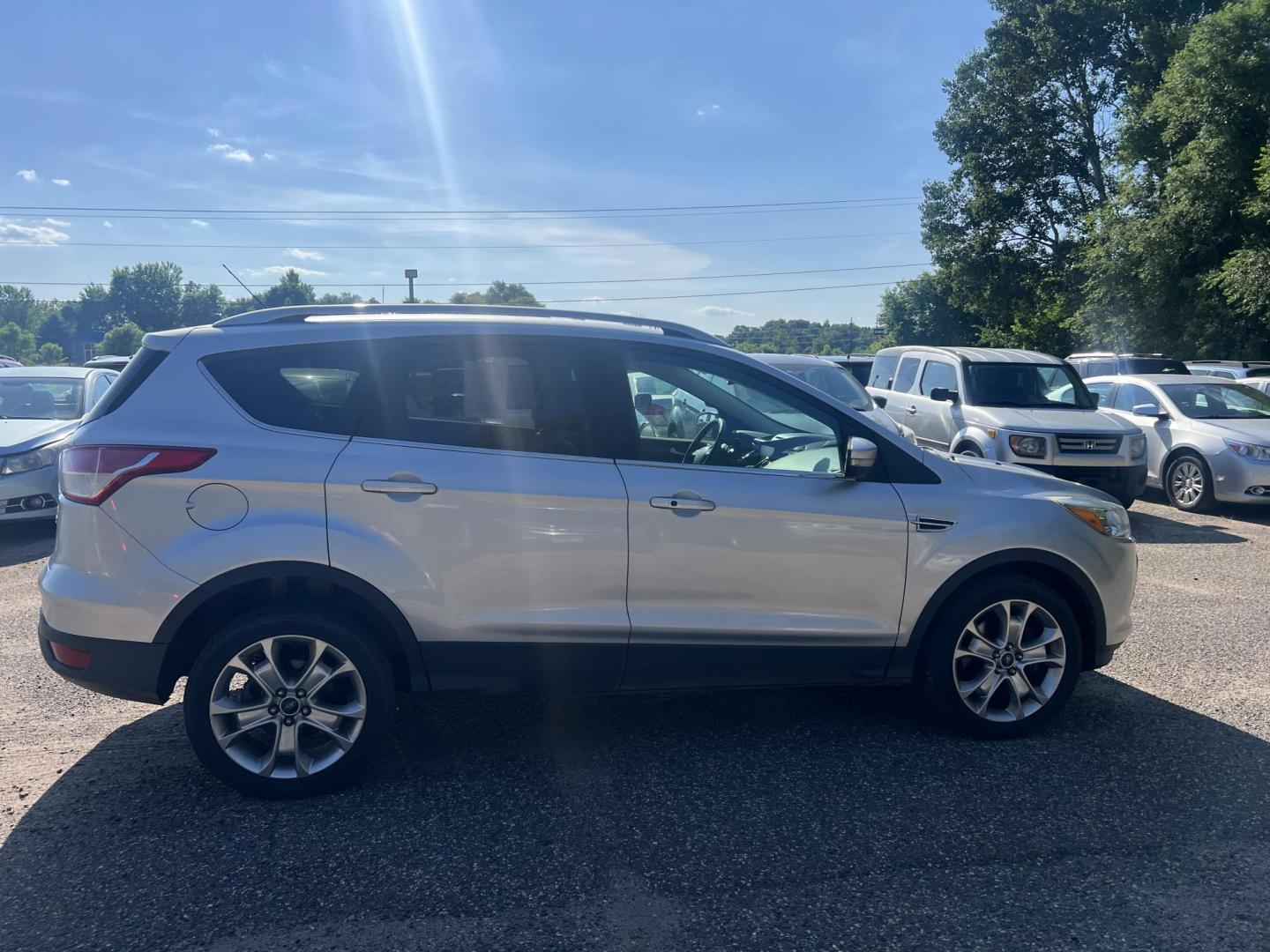2015 Ford Escape Titanium 4WD (1FMCU9J94FU) with an 2.0L L4 DOHC 16V engine, 6-Speed Automatic transmission, located at 17255 hwy 65 NE, Ham Lake, MN, 55304, 0.000000, 0.000000 - Photo#5