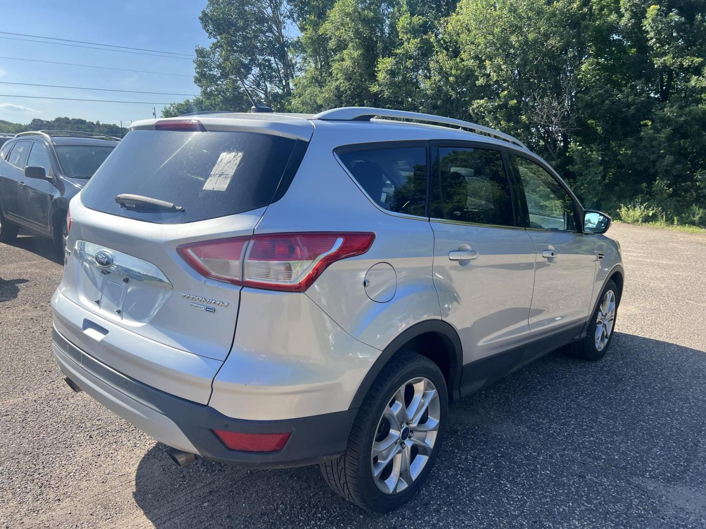 2015 Ford Escape Titanium 4WD (1FMCU9J94FU) with an 2.0L L4 DOHC 16V engine, 6-Speed Automatic transmission, located at 17255 hwy 65 NE, Ham Lake, MN, 55304, 0.000000, 0.000000 - Photo#4