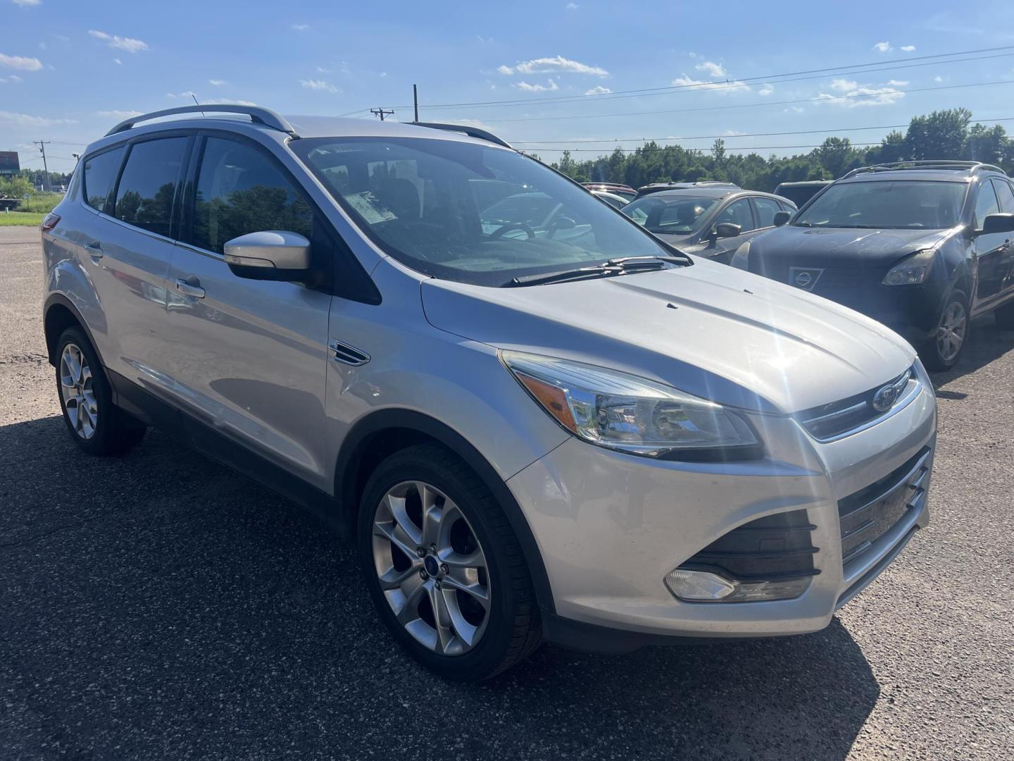 2015 Ford Escape Titanium 4WD (1FMCU9J94FU) with an 2.0L L4 DOHC 16V engine, 6-Speed Automatic transmission, located at 17255 hwy 65 NE, Ham Lake, MN, 55304, 0.000000, 0.000000 - Photo#6