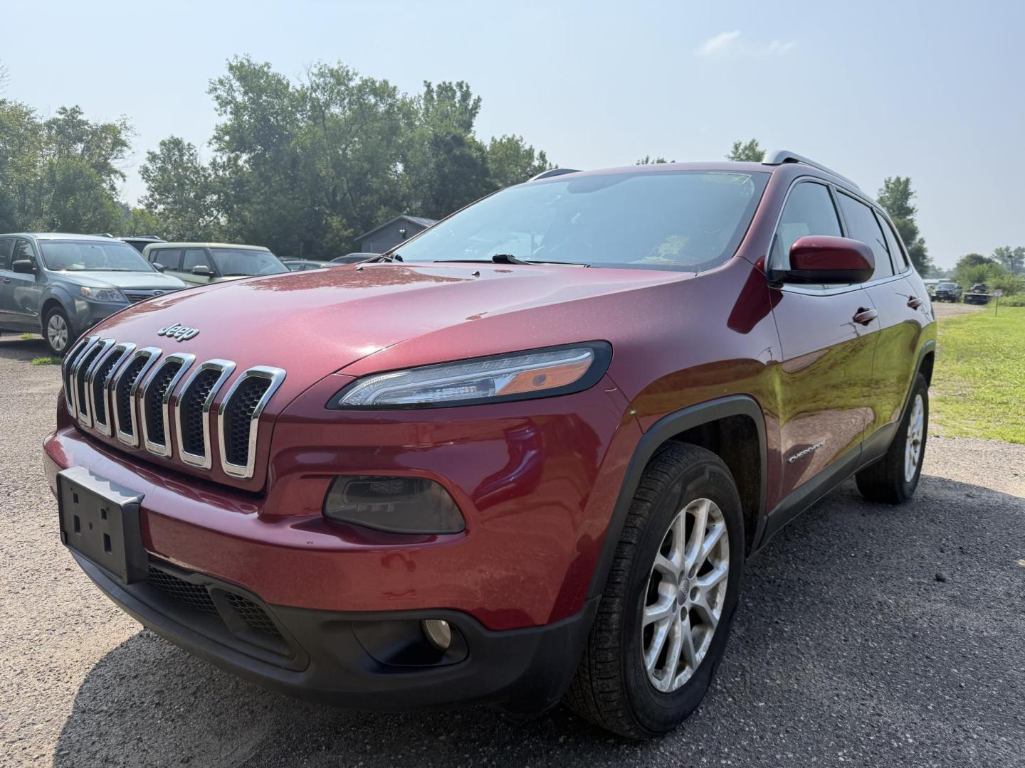 2014 Jeep Cherokee Latitude 4WD (1C4PJMCS1EW) with an 3.2L V6 DOHC 24V engine, 9-Speed Automatic transmission, located at 17255 hwy 65 NE, Ham Lake, MN, 55304, 0.000000, 0.000000 - Photo#0