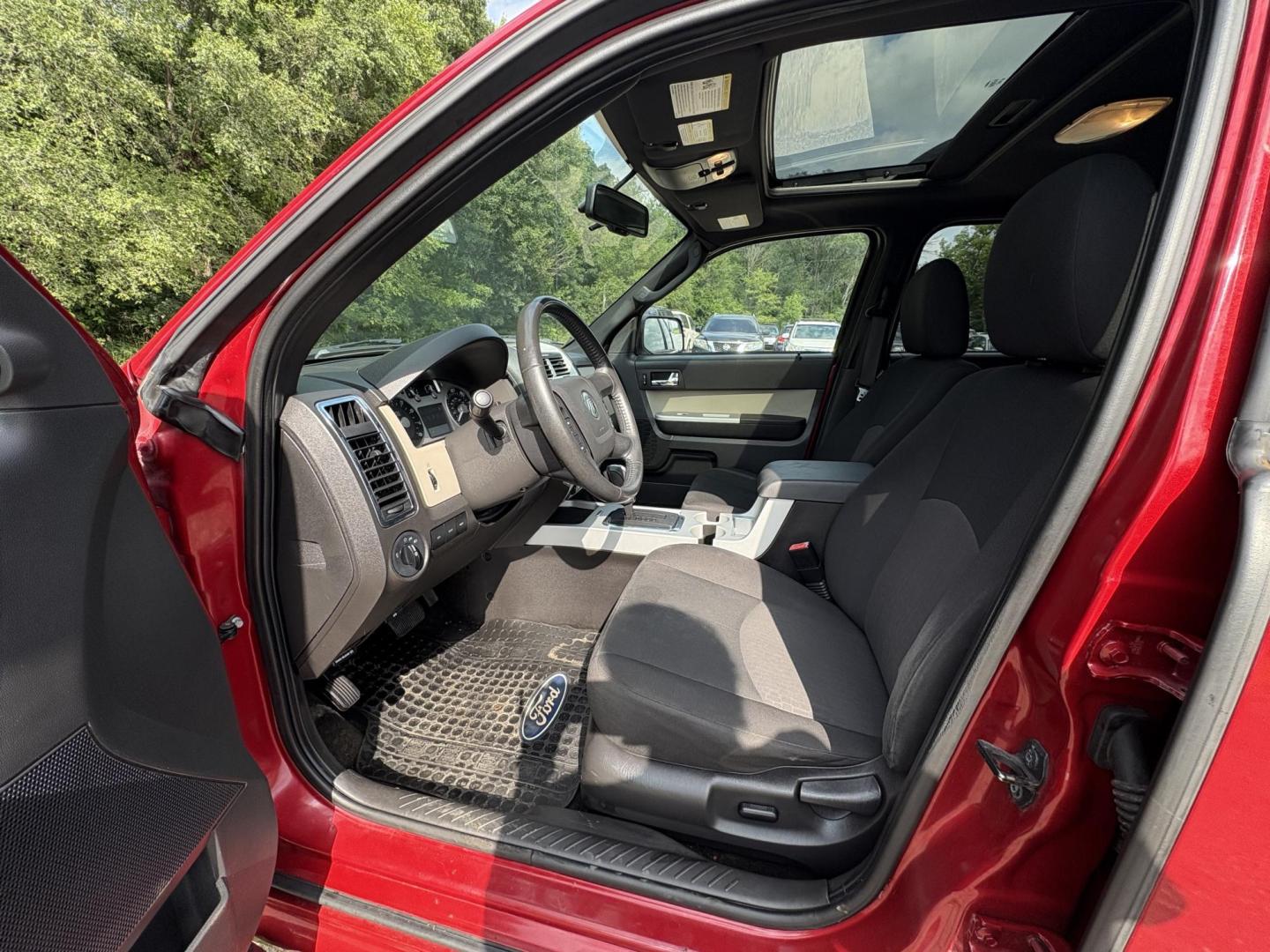 2010 Mercury Mariner I4 2WD (4M2CN8B72AK) with an 2.5L L4 DOHC 16V engine, 6-Speed Automatic transmission, located at 17255 hwy 65 NE, Ham Lake, MN, 55304, 0.000000, 0.000000 - Photo#9