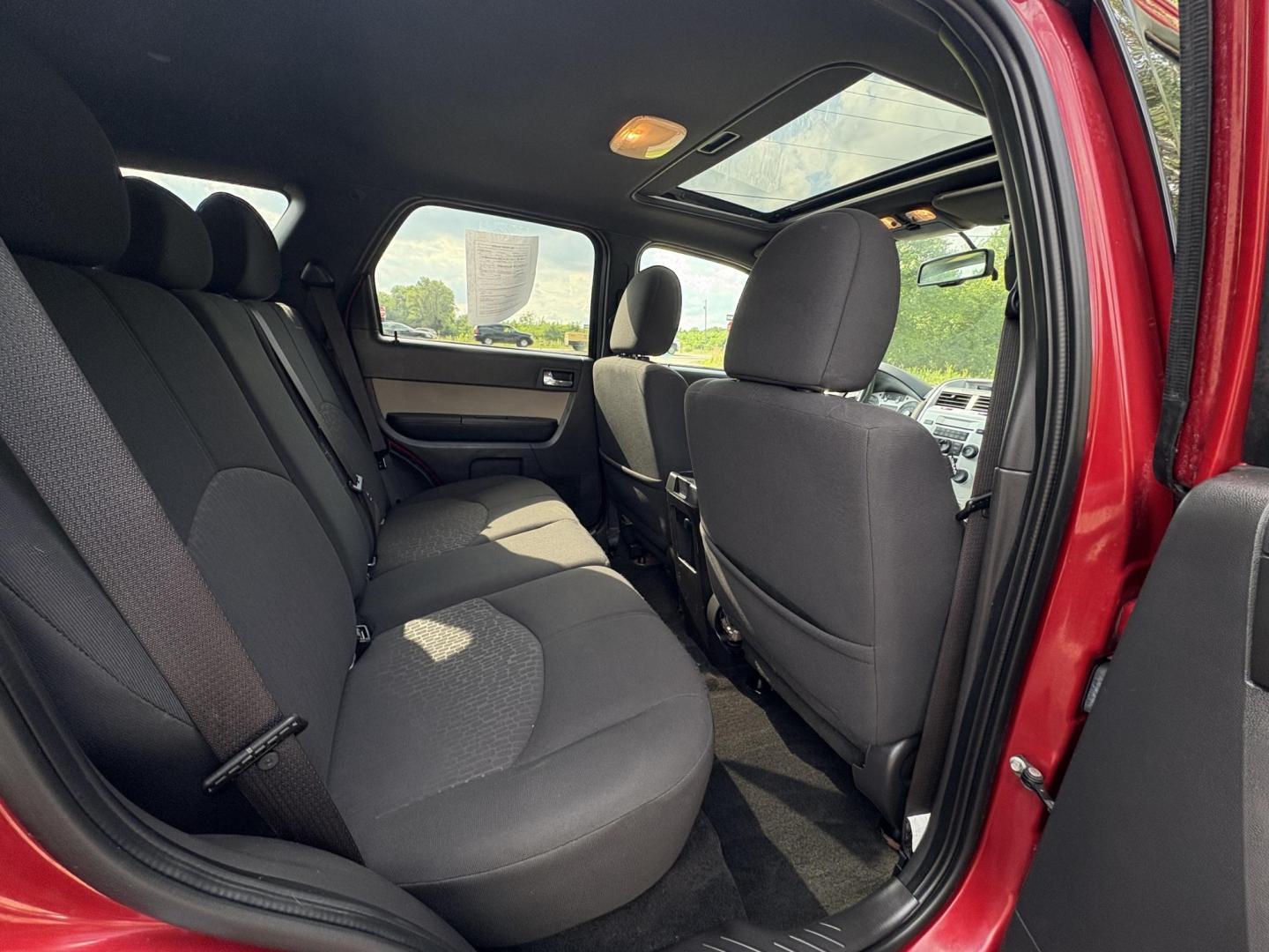 2010 Mercury Mariner I4 2WD (4M2CN8B72AK) with an 2.5L L4 DOHC 16V engine, 6-Speed Automatic transmission, located at 17255 hwy 65 NE, Ham Lake, MN, 55304, 0.000000, 0.000000 - Photo#13