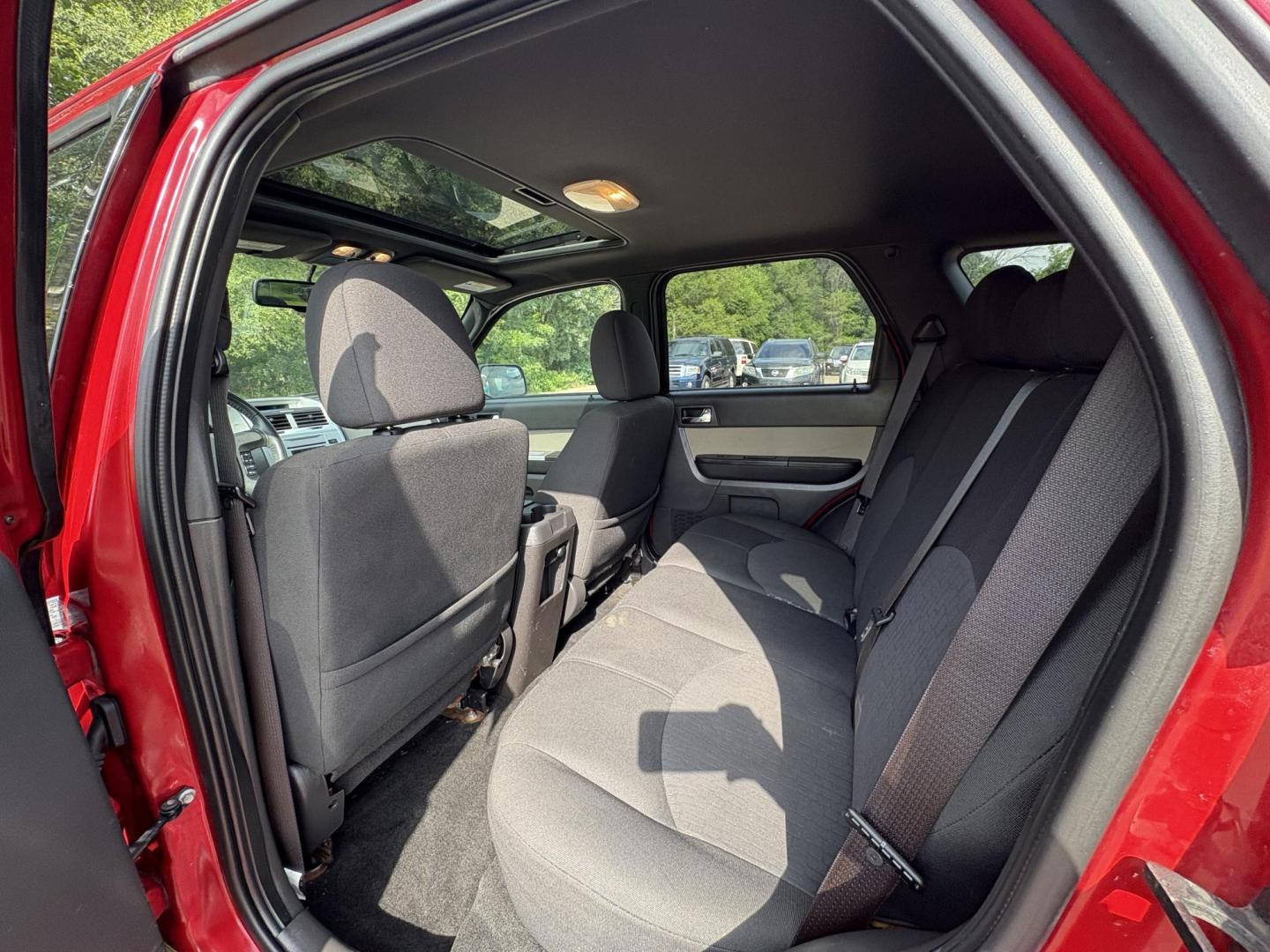 2010 Mercury Mariner I4 2WD (4M2CN8B72AK) with an 2.5L L4 DOHC 16V engine, 6-Speed Automatic transmission, located at 17255 hwy 65 NE, Ham Lake, MN, 55304, 0.000000, 0.000000 - Photo#11