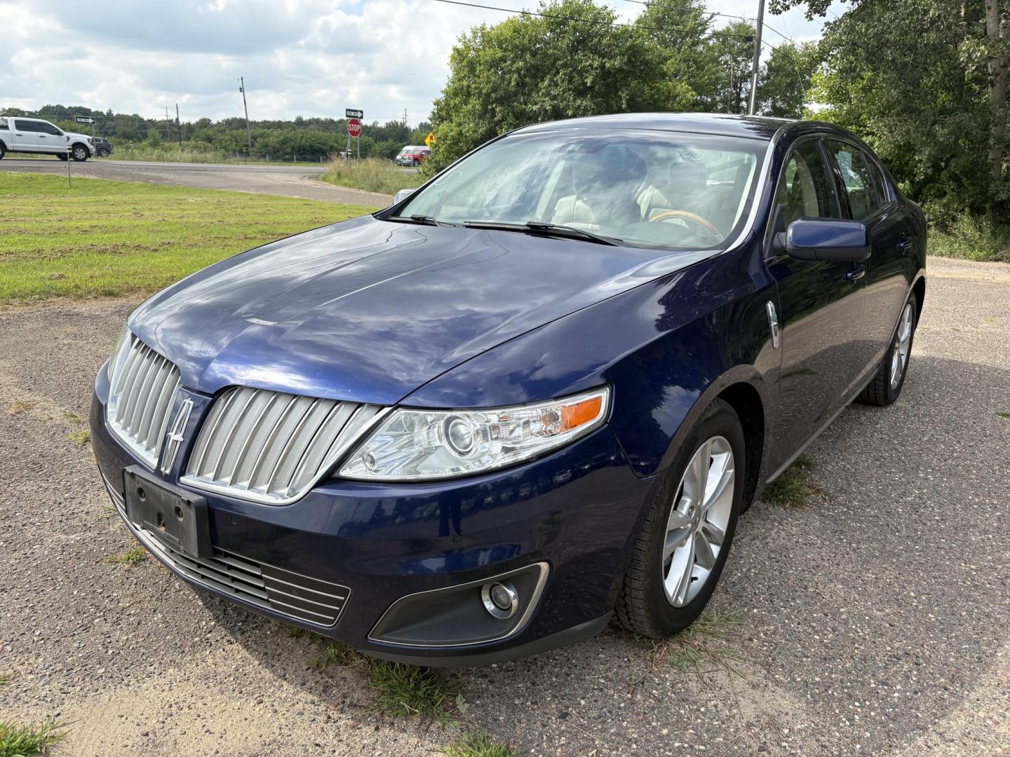 2011 Lincoln MKS 3.7L AWD (1LNHL9ER1BG) with an 3.7L V6 DOHC 24V engine, 6-Speed Automatic transmission, located at 17255 hwy 65 NE, Ham Lake, MN, 55304, 0.000000, 0.000000 - Photo#0