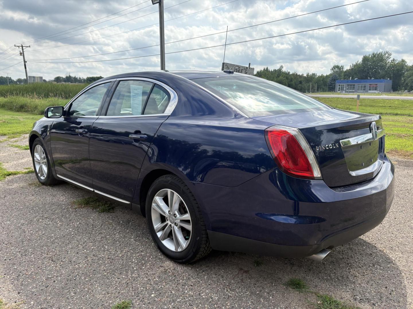 2011 Lincoln MKS 3.7L AWD (1LNHL9ER1BG) with an 3.7L V6 DOHC 24V engine, 6-Speed Automatic transmission, located at 17255 hwy 65 NE, Ham Lake, MN, 55304, 0.000000, 0.000000 - Photo#2