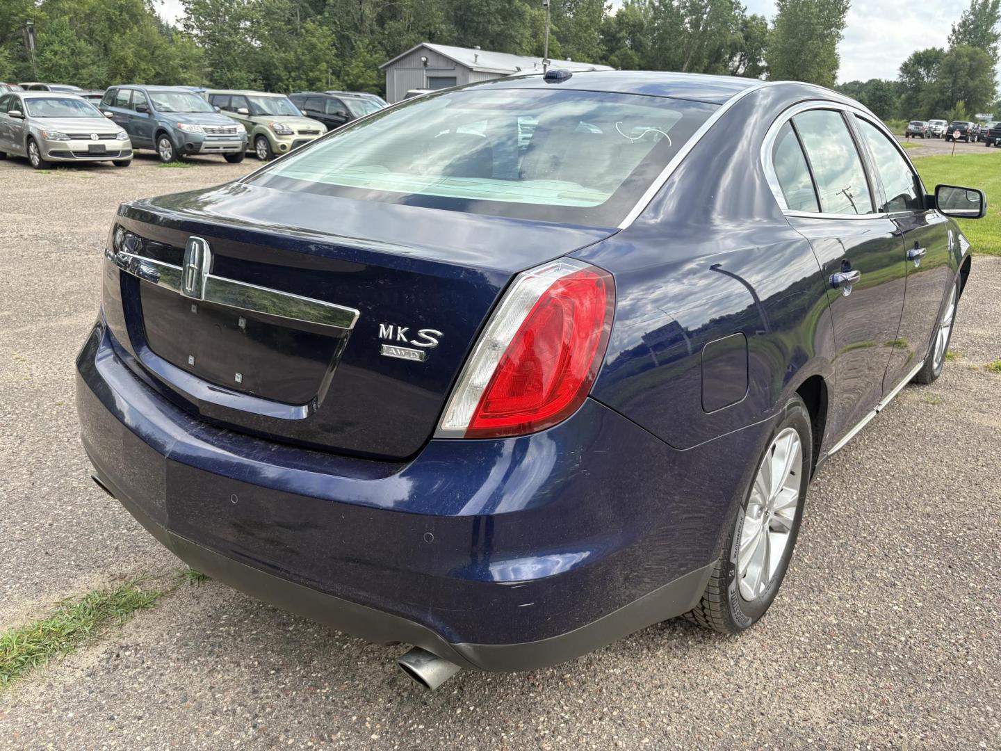 2011 Lincoln MKS 3.7L AWD (1LNHL9ER1BG) with an 3.7L V6 DOHC 24V engine, 6-Speed Automatic transmission, located at 17255 hwy 65 NE, Ham Lake, MN, 55304, 0.000000, 0.000000 - Photo#4