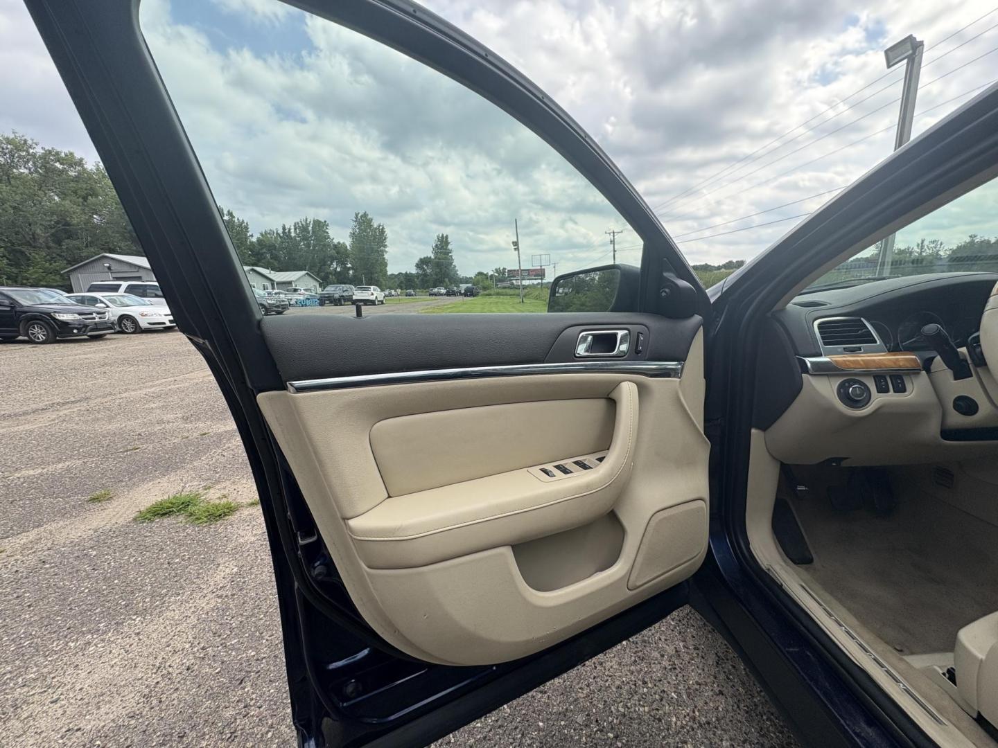2011 Lincoln MKS 3.7L AWD (1LNHL9ER1BG) with an 3.7L V6 DOHC 24V engine, 6-Speed Automatic transmission, located at 17255 hwy 65 NE, Ham Lake, MN, 55304, 0.000000, 0.000000 - Photo#8