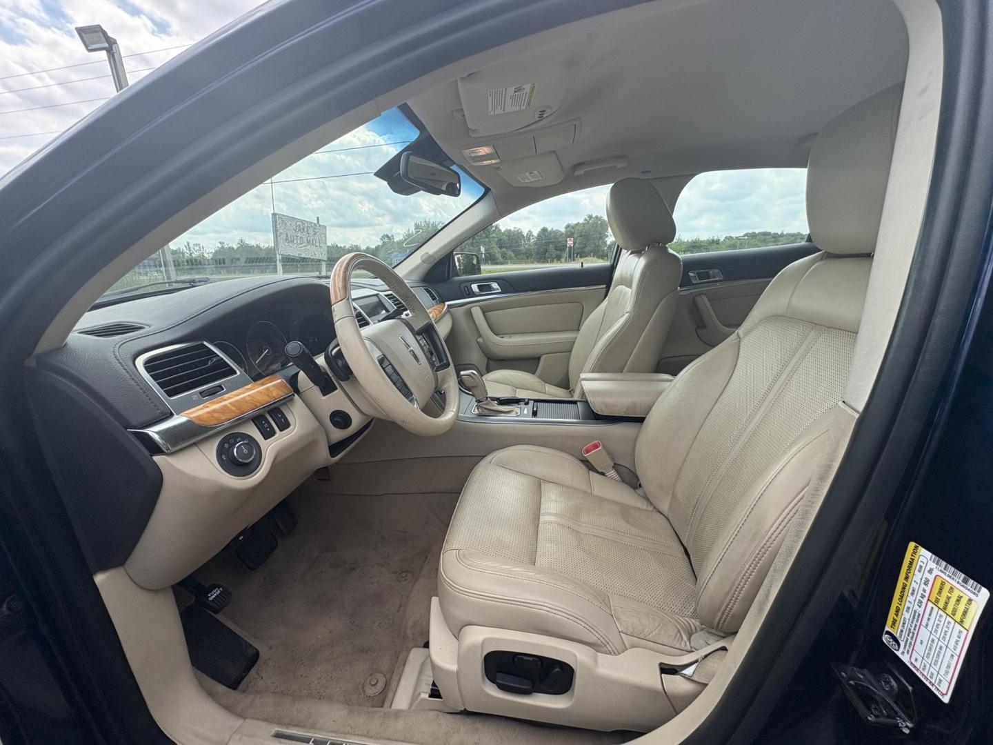 2011 Lincoln MKS 3.7L AWD (1LNHL9ER1BG) with an 3.7L V6 DOHC 24V engine, 6-Speed Automatic transmission, located at 17255 hwy 65 NE, Ham Lake, MN, 55304, 0.000000, 0.000000 - Photo#9