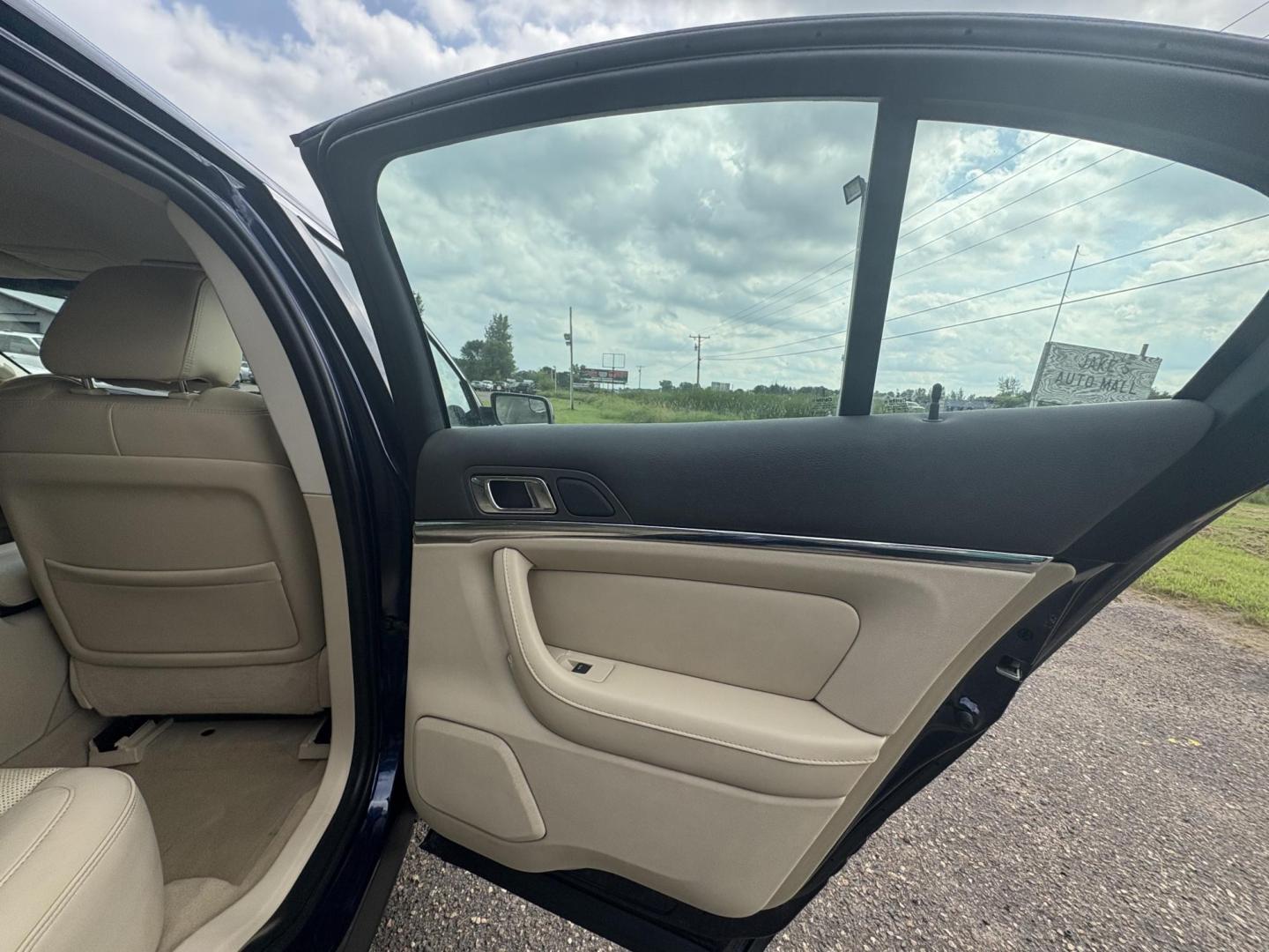 2011 Lincoln MKS 3.7L AWD (1LNHL9ER1BG) with an 3.7L V6 DOHC 24V engine, 6-Speed Automatic transmission, located at 17255 hwy 65 NE, Ham Lake, MN, 55304, 0.000000, 0.000000 - Photo#12