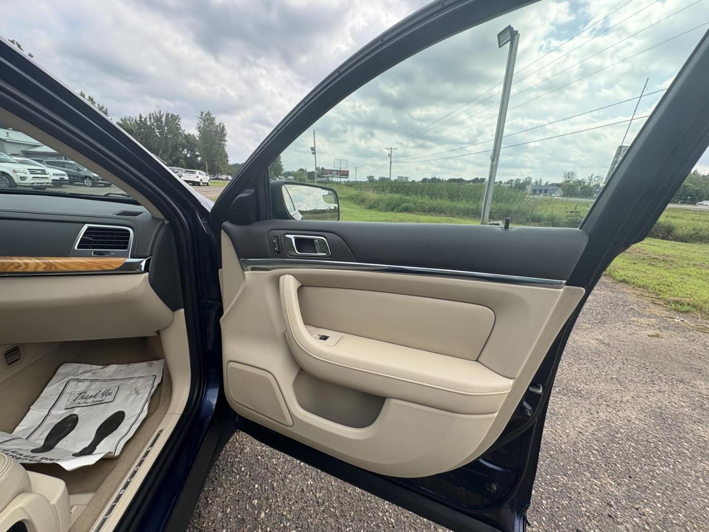 2011 Lincoln MKS 3.7L AWD (1LNHL9ER1BG) with an 3.7L V6 DOHC 24V engine, 6-Speed Automatic transmission, located at 17255 hwy 65 NE, Ham Lake, MN, 55304, 0.000000, 0.000000 - Photo#14