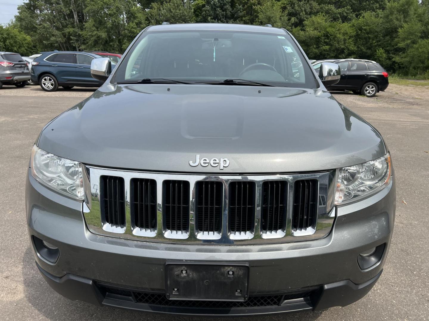 2012 Jeep Grand Cherokee Laredo 4WD (1C4RJFAT8CC) with an 5.7L V8 OHV 16V engine, 5-Speed Automatic transmission, located at 17255 hwy 65 NE, Ham Lake, MN, 55304, 0.000000, 0.000000 - Photo#1