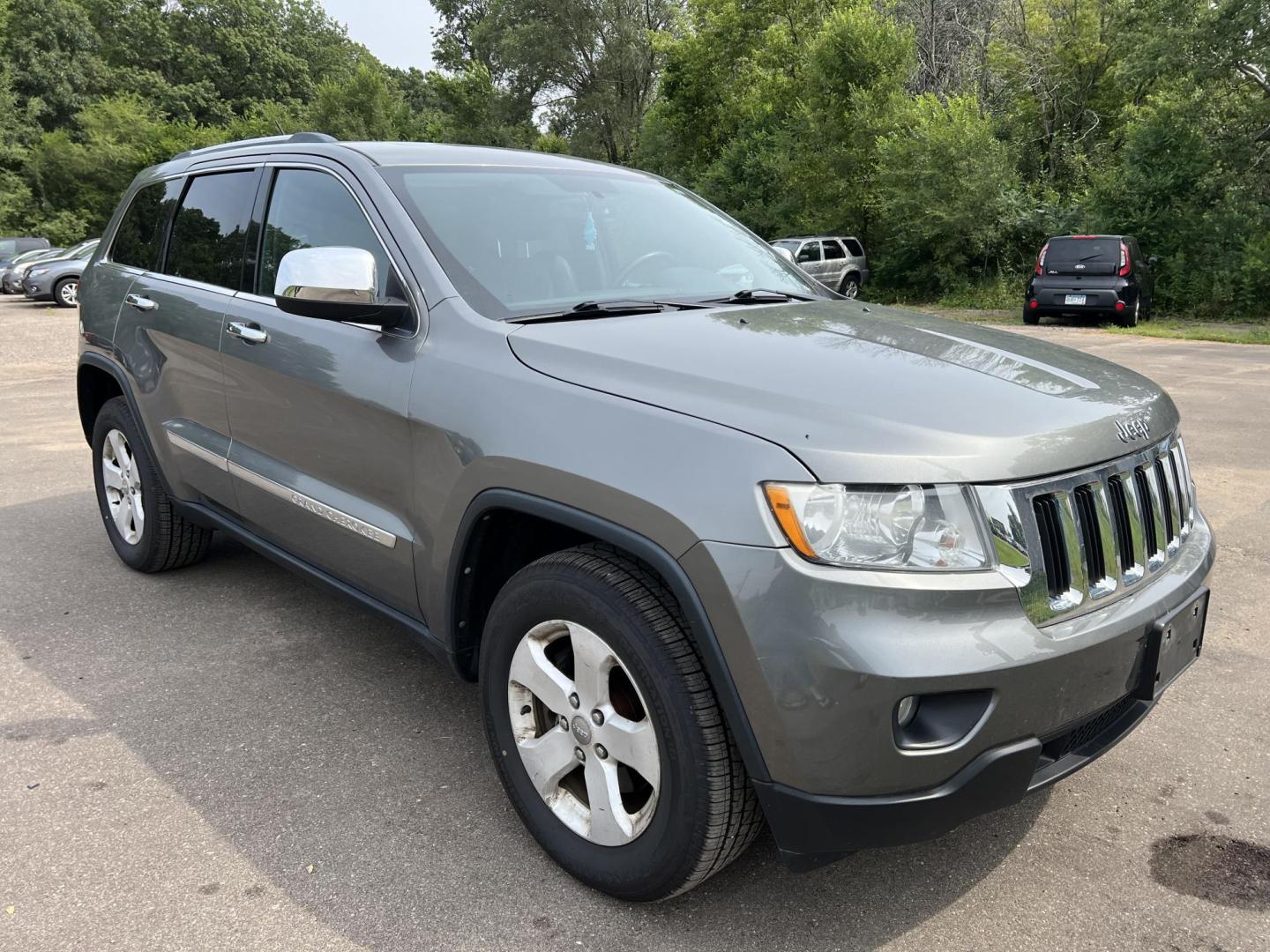 2012 Jeep Grand Cherokee Laredo 4WD (1C4RJFAT8CC) with an 5.7L V8 OHV 16V engine, 5-Speed Automatic transmission, located at 17255 hwy 65 NE, Ham Lake, MN, 55304, 0.000000, 0.000000 - Photo#2