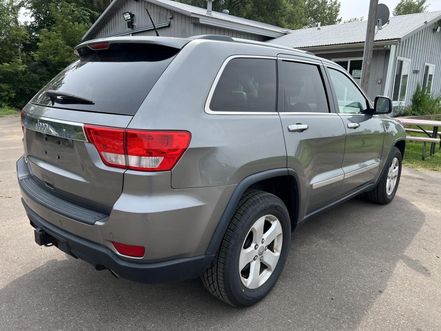 2012 Jeep Grand Cherokee Laredo 4WD (1C4RJFAT8CC) with an 5.7L V8 OHV 16V engine, 5-Speed Automatic transmission, located at 17255 hwy 65 NE, Ham Lake, MN, 55304, 0.000000, 0.000000 - Photo#4