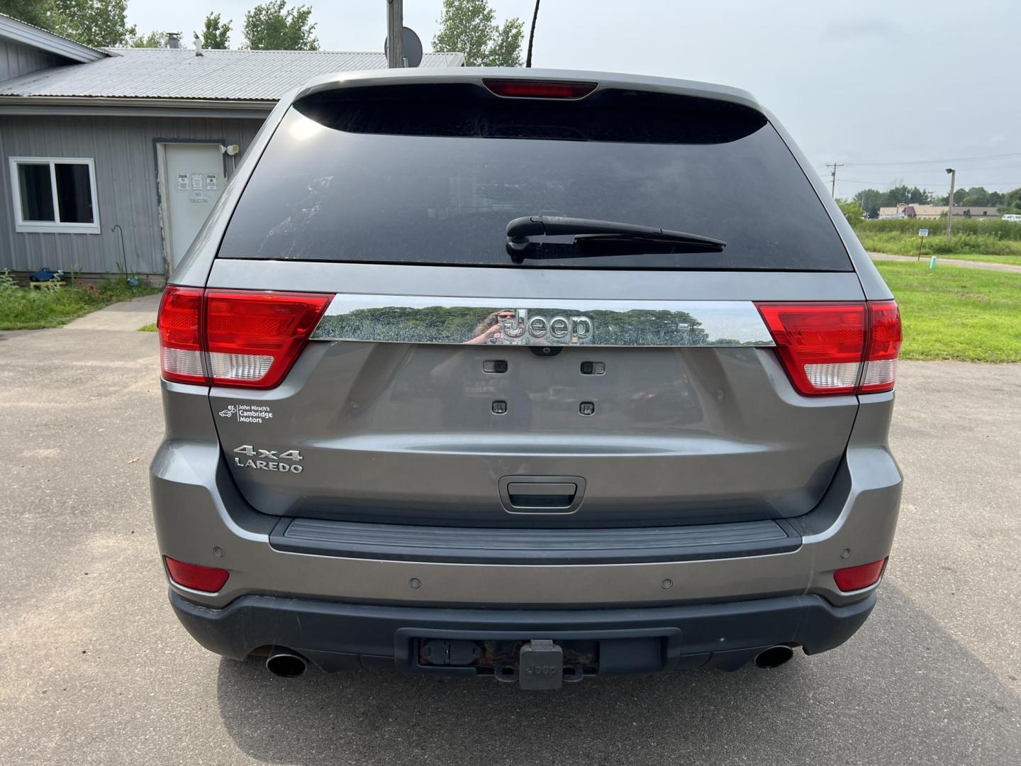 2012 Jeep Grand Cherokee Laredo 4WD (1C4RJFAT8CC) with an 5.7L V8 OHV 16V engine, 5-Speed Automatic transmission, located at 17255 hwy 65 NE, Ham Lake, MN, 55304, 0.000000, 0.000000 - Photo#5