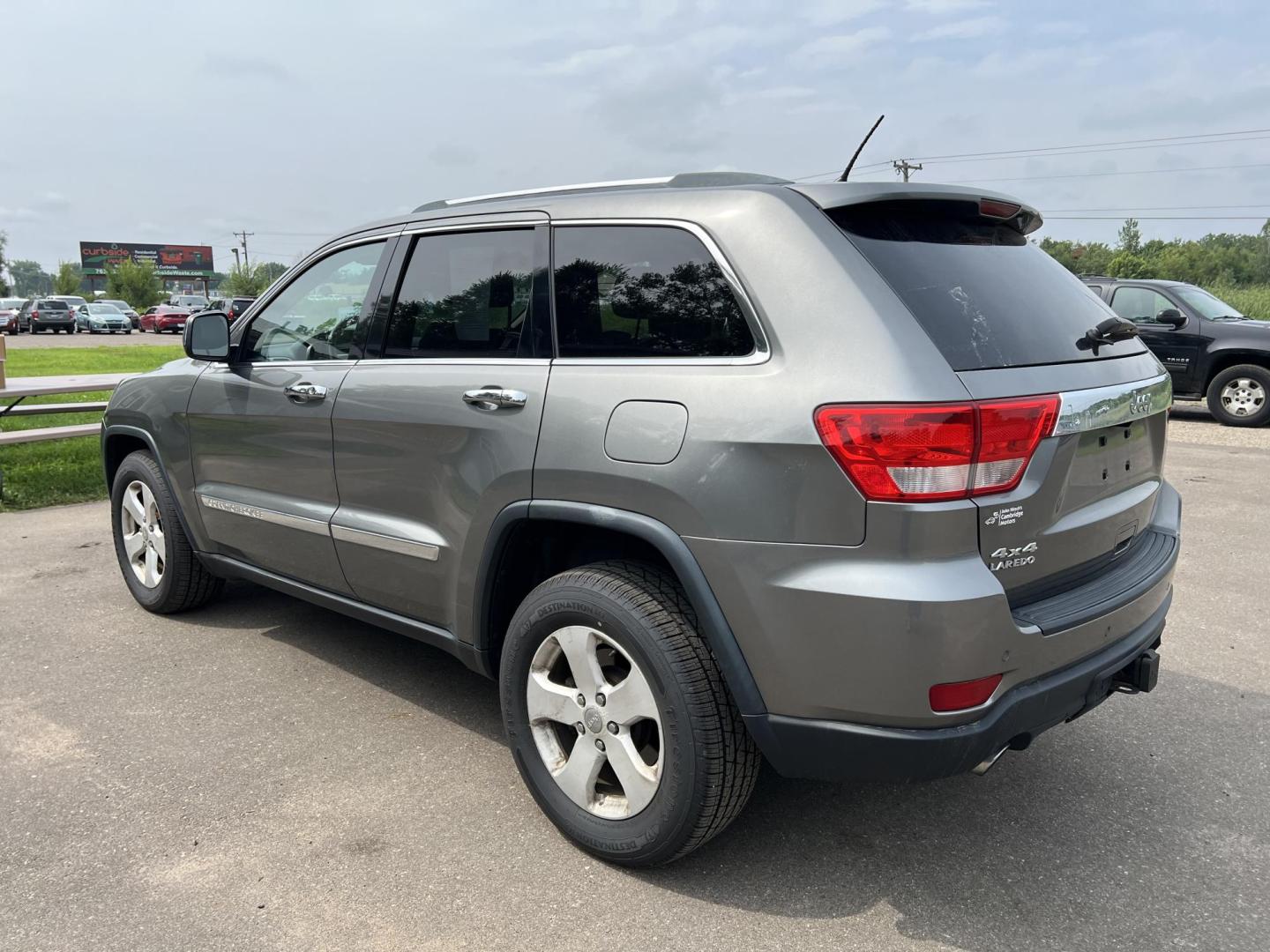 2012 Jeep Grand Cherokee Laredo 4WD (1C4RJFAT8CC) with an 5.7L V8 OHV 16V engine, 5-Speed Automatic transmission, located at 17255 hwy 65 NE, Ham Lake, MN, 55304, 0.000000, 0.000000 - Photo#6