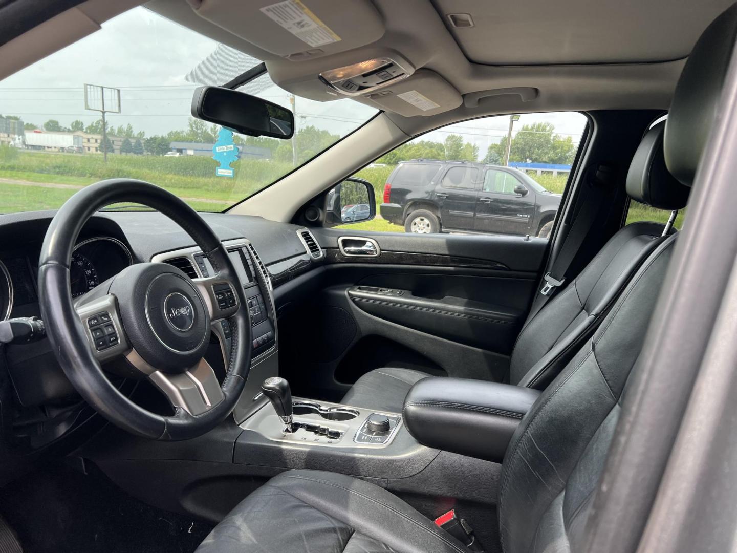 2012 Jeep Grand Cherokee Laredo 4WD (1C4RJFAT8CC) with an 5.7L V8 OHV 16V engine, 5-Speed Automatic transmission, located at 17255 hwy 65 NE, Ham Lake, MN, 55304, 0.000000, 0.000000 - Photo#9