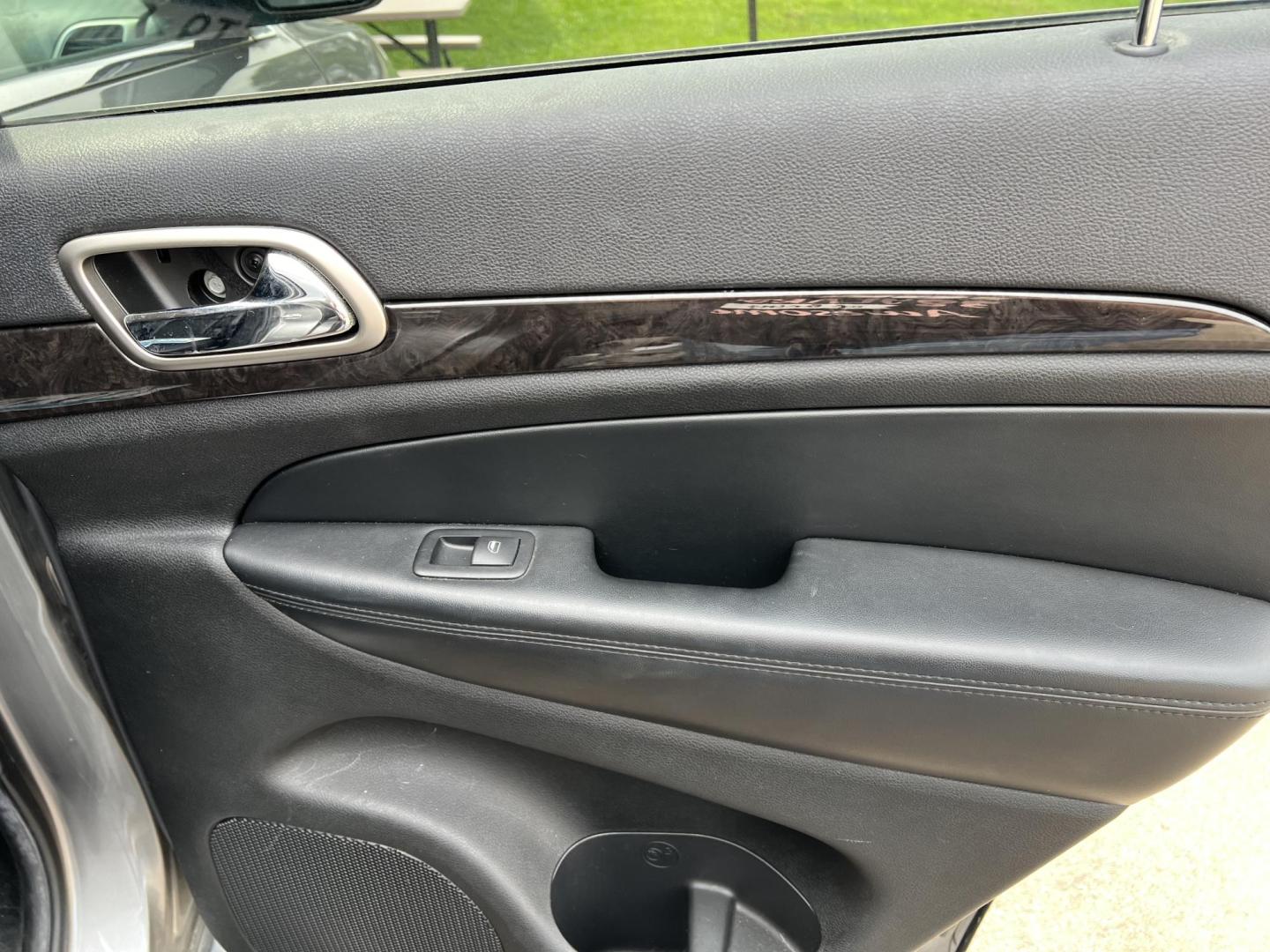 2012 Jeep Grand Cherokee Laredo 4WD (1C4RJFAT8CC) with an 5.7L V8 OHV 16V engine, 5-Speed Automatic transmission, located at 17255 hwy 65 NE, Ham Lake, MN, 55304, 0.000000, 0.000000 - Photo#15