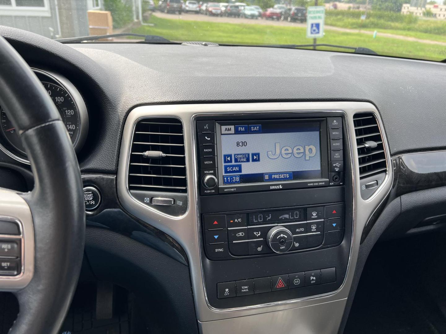 2012 Jeep Grand Cherokee Laredo 4WD (1C4RJFAT8CC) with an 5.7L V8 OHV 16V engine, 5-Speed Automatic transmission, located at 17255 hwy 65 NE, Ham Lake, MN, 55304, 0.000000, 0.000000 - Photo#18