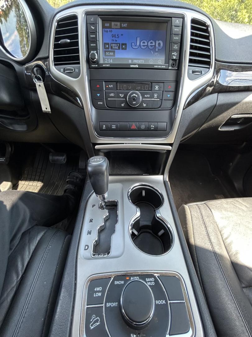 2012 Jeep Grand Cherokee Laredo 4WD (1C4RJFAT8CC) with an 5.7L V8 OHV 16V engine, 5-Speed Automatic transmission, located at 17255 hwy 65 NE, Ham Lake, MN, 55304, 0.000000, 0.000000- Photo#20