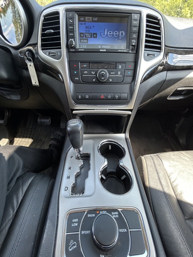 2012 Jeep Grand Cherokee Laredo 4WD (1C4RJFAT8CC) with an 5.7L V8 OHV 16V engine, 5-Speed Automatic transmission, located at 17255 hwy 65 NE, Ham Lake, MN, 55304, 0.000000, 0.000000- Photo#20