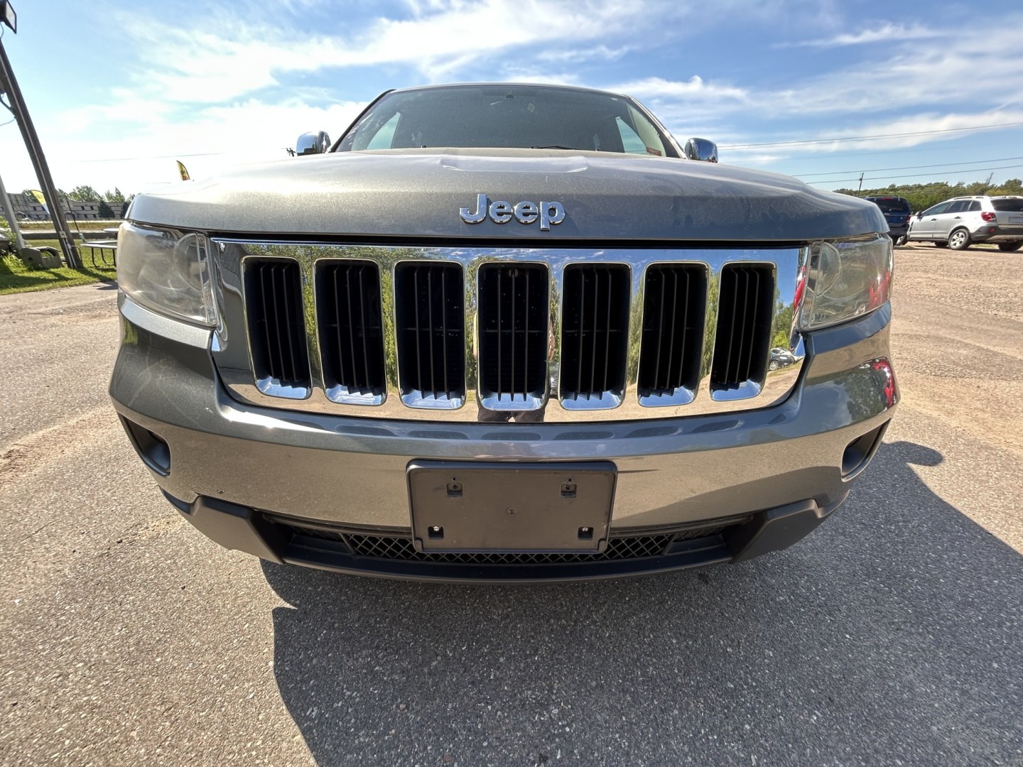 2012 Jeep Grand Cherokee Laredo 4WD (1C4RJFAT8CC) with an 5.7L V8 OHV 16V engine, 5-Speed Automatic transmission, located at 17255 hwy 65 NE, Ham Lake, MN, 55304, 0.000000, 0.000000- Photo#1