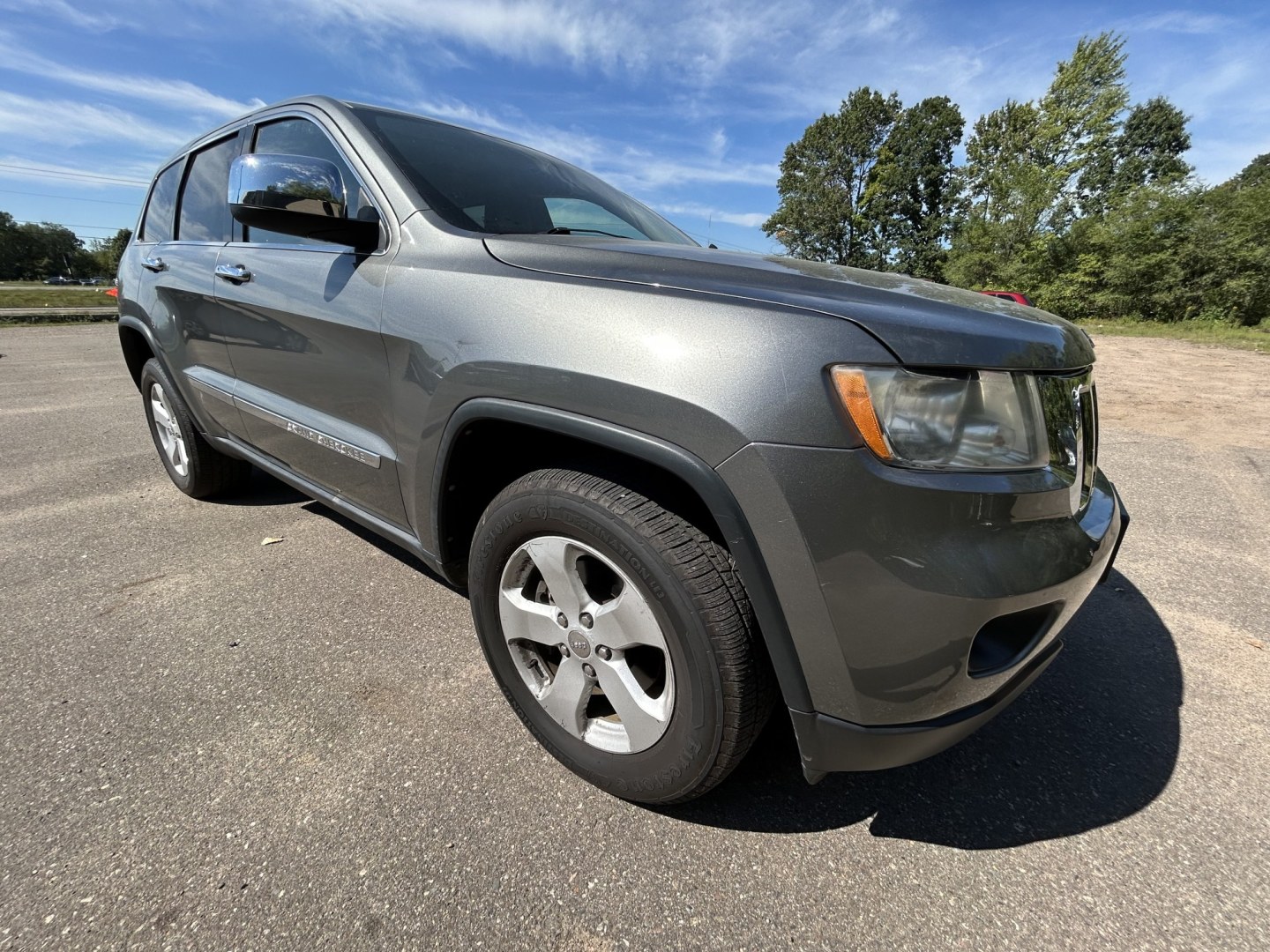 2012 Jeep Grand Cherokee Laredo 4WD (1C4RJFAT8CC) with an 5.7L V8 OHV 16V engine, 5-Speed Automatic transmission, located at 17255 hwy 65 NE, Ham Lake, MN, 55304, 0.000000, 0.000000- Photo#2