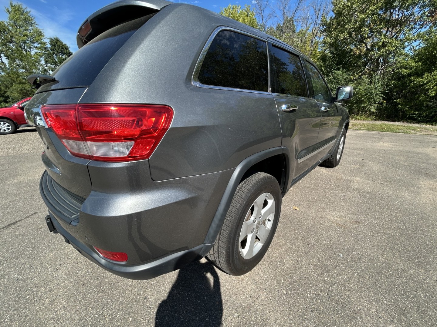 2012 Jeep Grand Cherokee Laredo 4WD (1C4RJFAT8CC) with an 5.7L V8 OHV 16V engine, 5-Speed Automatic transmission, located at 17255 hwy 65 NE, Ham Lake, MN, 55304, 0.000000, 0.000000- Photo#4