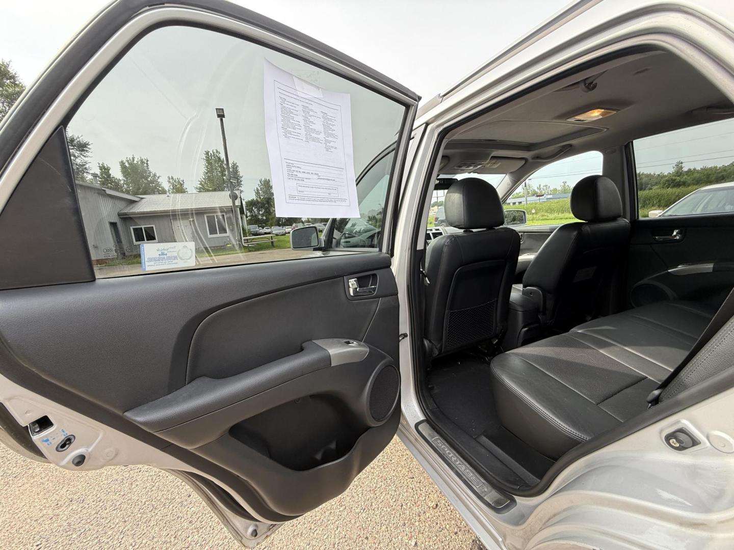 2008 Kia Sportage EX V6 4WD (KNDJE723687) with an 2.7L V6 DOHC 24V engine, 4-Speed Automatic Overdrive transmission, located at 17255 hwy 65 NE, Ham Lake, MN, 55304, 0.000000, 0.000000 - Photo#10