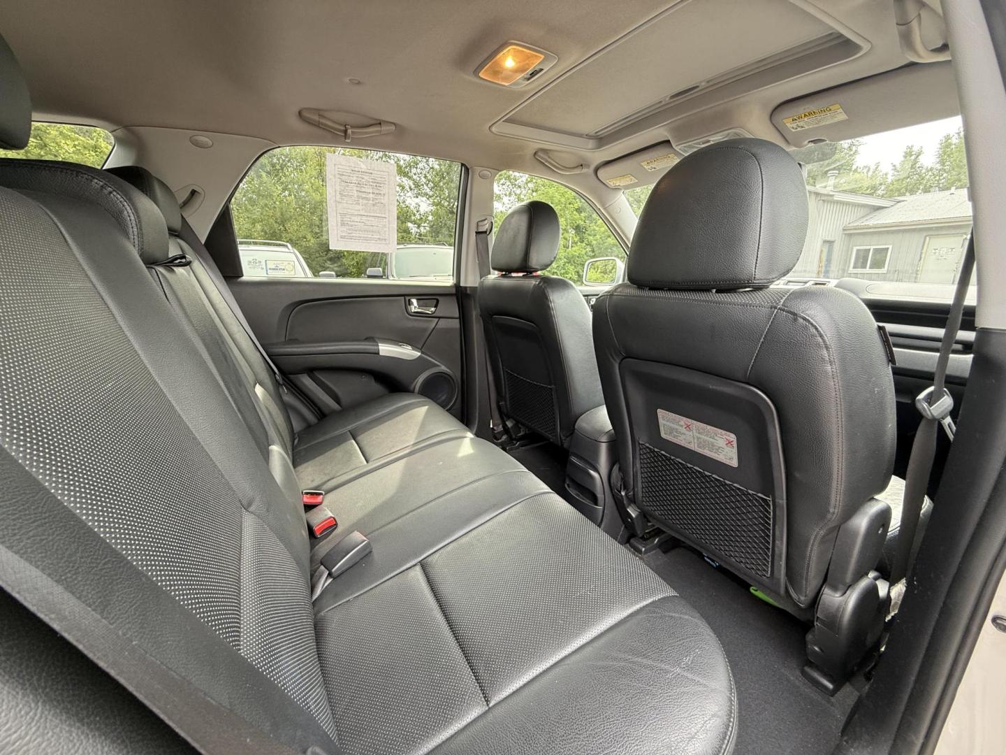 2008 Kia Sportage EX V6 4WD (KNDJE723687) with an 2.7L V6 DOHC 24V engine, 4-Speed Automatic Overdrive transmission, located at 17255 hwy 65 NE, Ham Lake, MN, 55304, 0.000000, 0.000000 - Photo#13