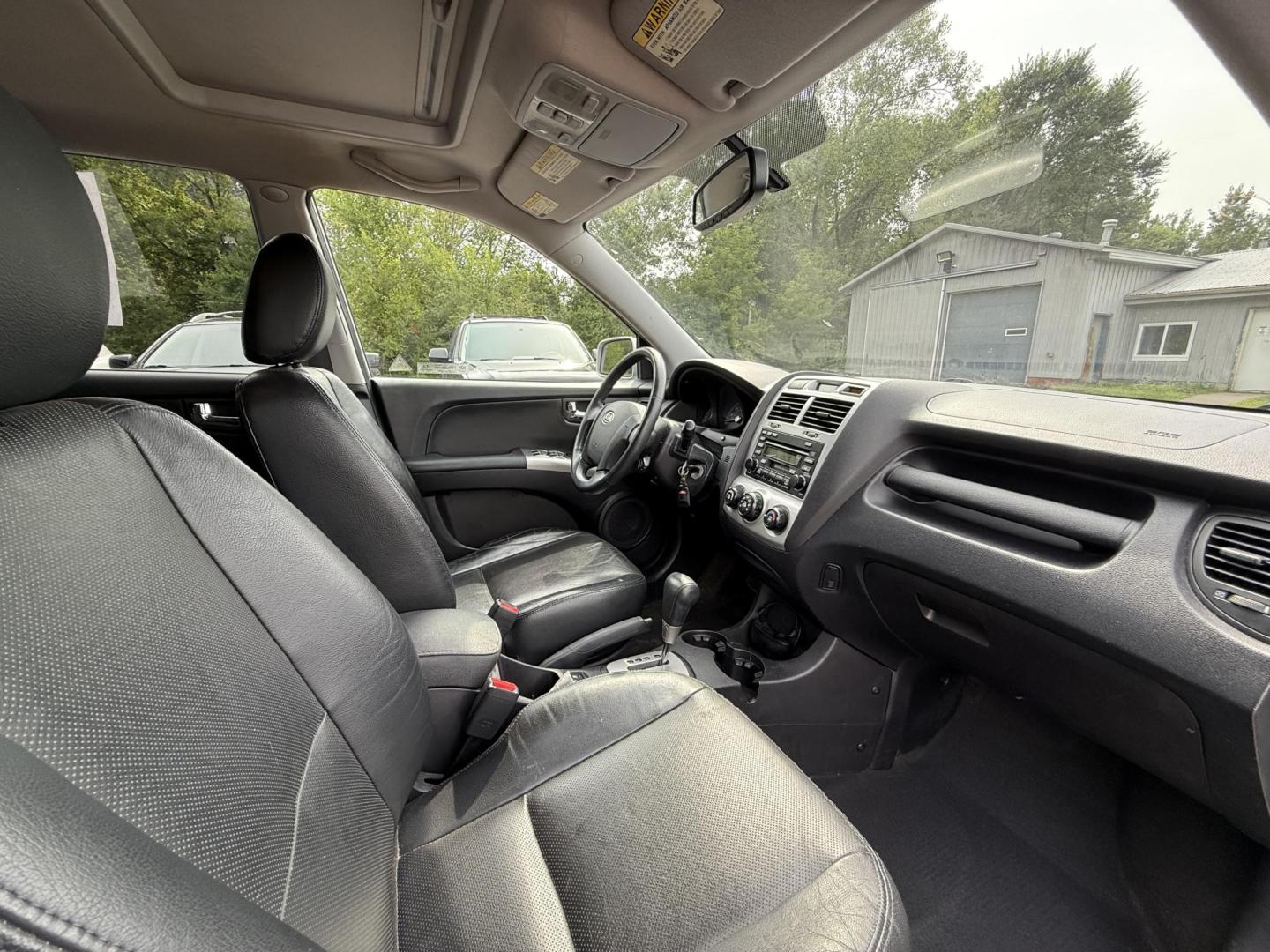 2008 Kia Sportage EX V6 4WD (KNDJE723687) with an 2.7L V6 DOHC 24V engine, 4-Speed Automatic Overdrive transmission, located at 17255 hwy 65 NE, Ham Lake, MN, 55304, 0.000000, 0.000000 - Photo#15