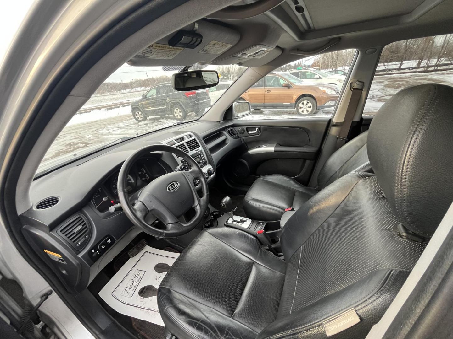 2008 Kia Sportage EX V6 4WD (KNDJE723687) with an 2.7L V6 DOHC 24V engine, 4-Speed Automatic Overdrive transmission, located at 17255 hwy 65 NE, Ham Lake, MN, 55304, 0.000000, 0.000000 - Photo#9