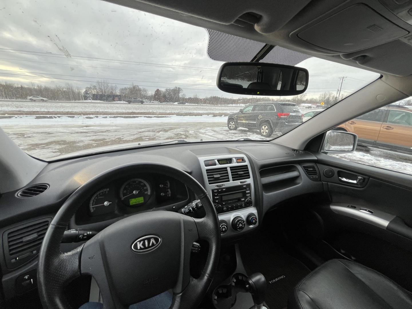 2008 Kia Sportage EX V6 4WD (KNDJE723687) with an 2.7L V6 DOHC 24V engine, 4-Speed Automatic Overdrive transmission, located at 17255 hwy 65 NE, Ham Lake, MN, 55304, 0.000000, 0.000000 - Photo#16