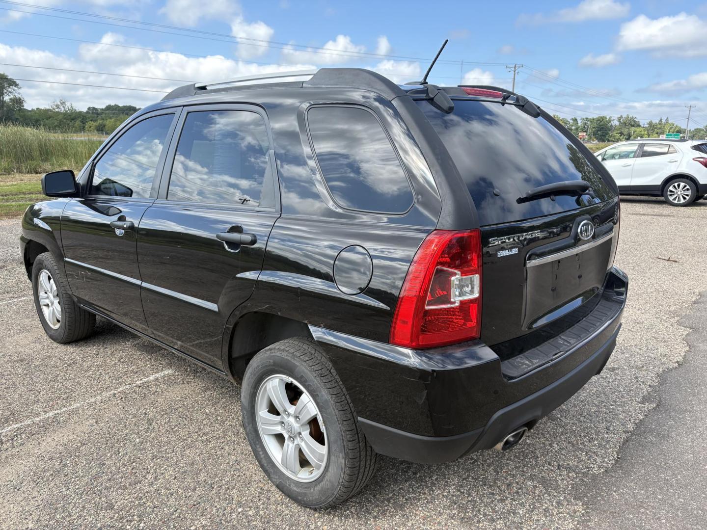 2010 Kia Sportage LX 2WD AT (KNDKG3A47A7) with an 2.0L L4 DOHC 16V engine, 4-Speed Automatic transmission, located at 17255 hwy 65 NE, Ham Lake, MN, 55304, 0.000000, 0.000000 - Photo#2