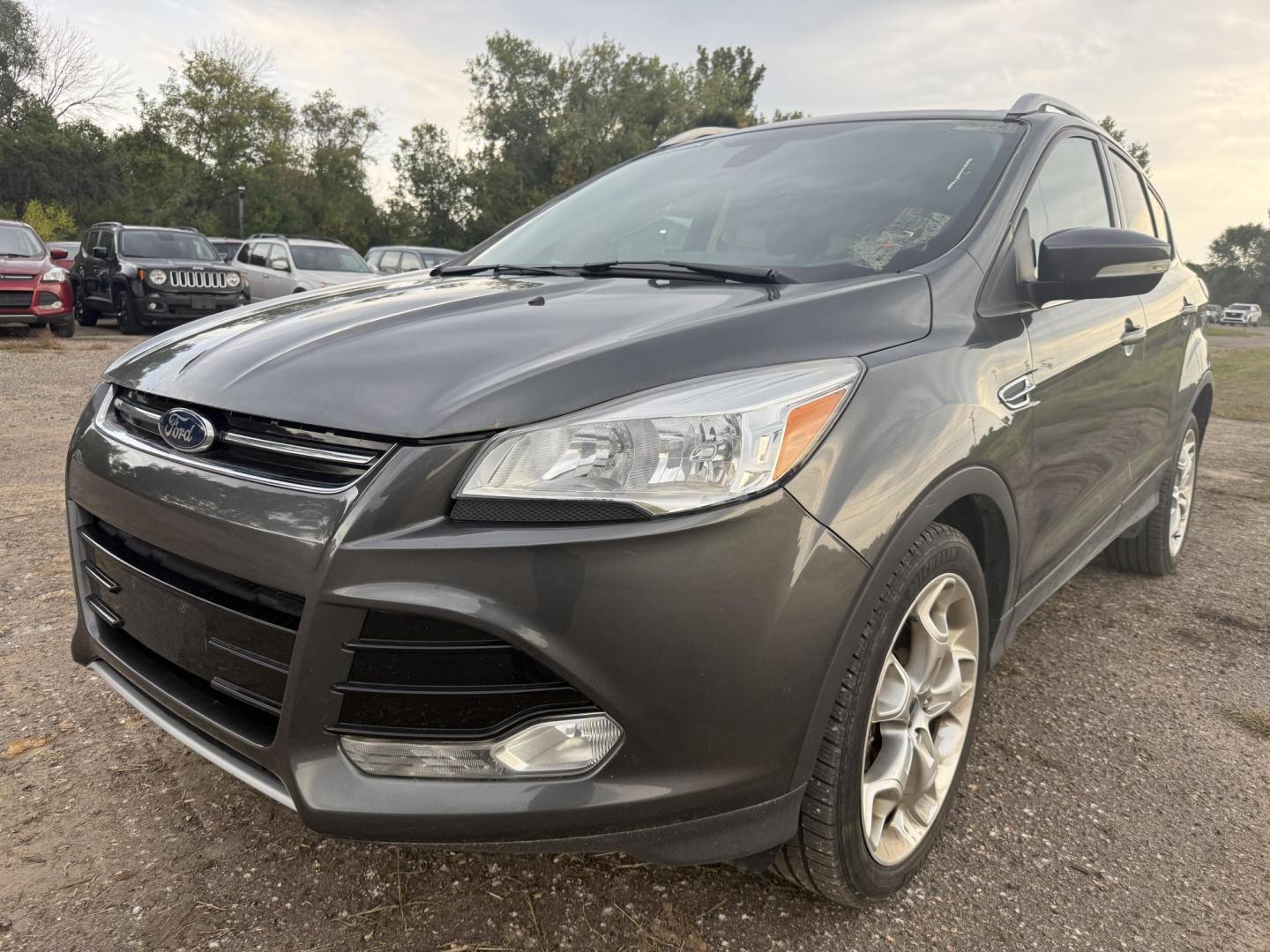 2015 Ford Escape Titanium 4WD (1FMCU9J94FU) with an 2.0L L4 DOHC 16V engine, 6-Speed Automatic transmission, located at 17255 hwy 65 NE, Ham Lake, MN, 55304, 0.000000, 0.000000 - Photo#0
