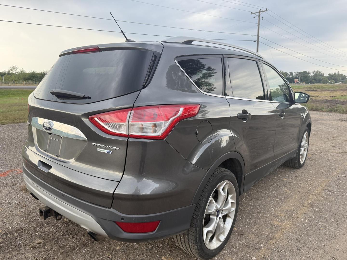 2015 Ford Escape Titanium 4WD (1FMCU9J94FU) with an 2.0L L4 DOHC 16V engine, 6-Speed Automatic transmission, located at 17255 hwy 65 NE, Ham Lake, MN, 55304, 0.000000, 0.000000 - Photo#4