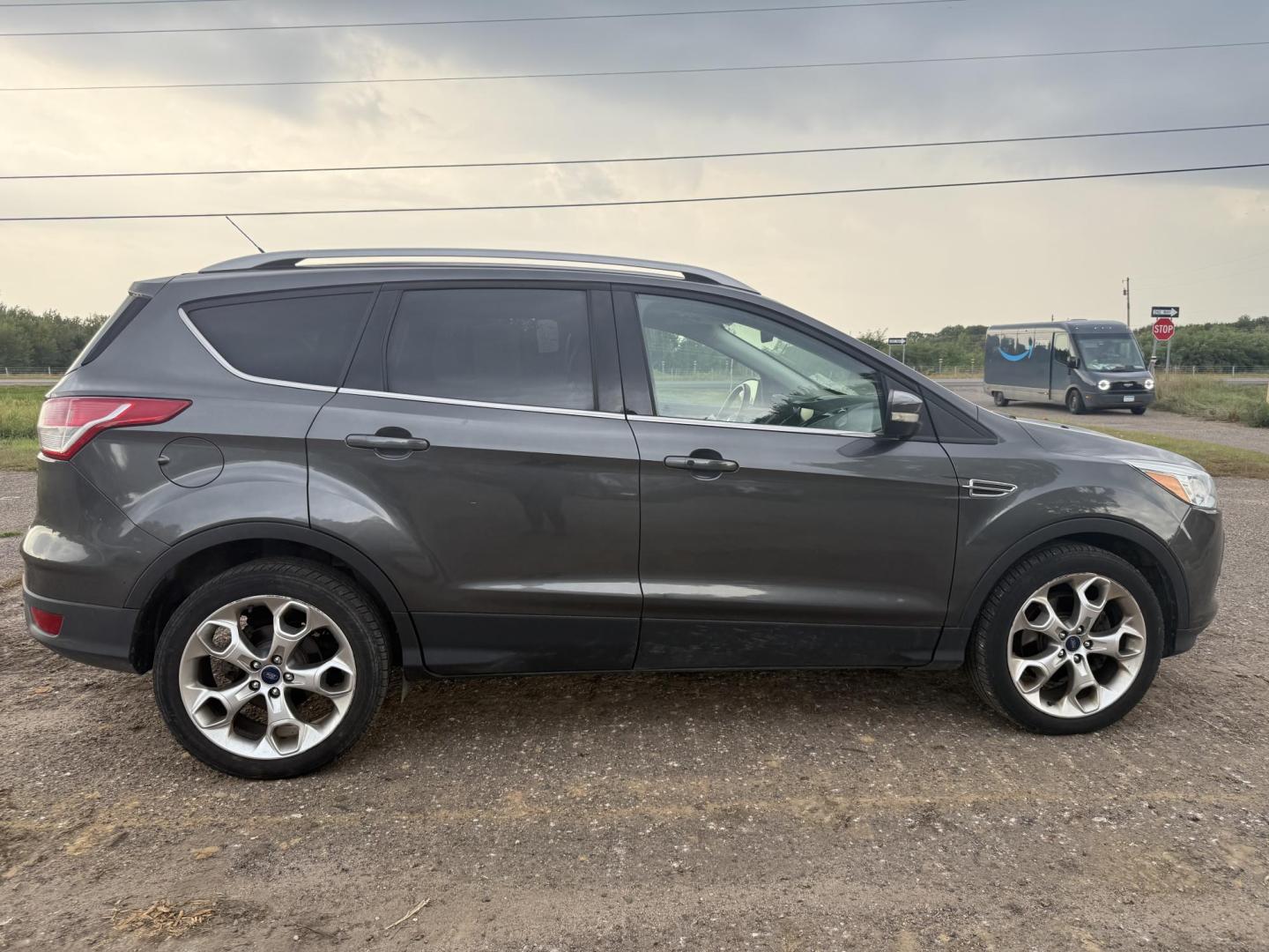 2015 Ford Escape Titanium 4WD (1FMCU9J94FU) with an 2.0L L4 DOHC 16V engine, 6-Speed Automatic transmission, located at 17255 hwy 65 NE, Ham Lake, MN, 55304, 0.000000, 0.000000 - Photo#5
