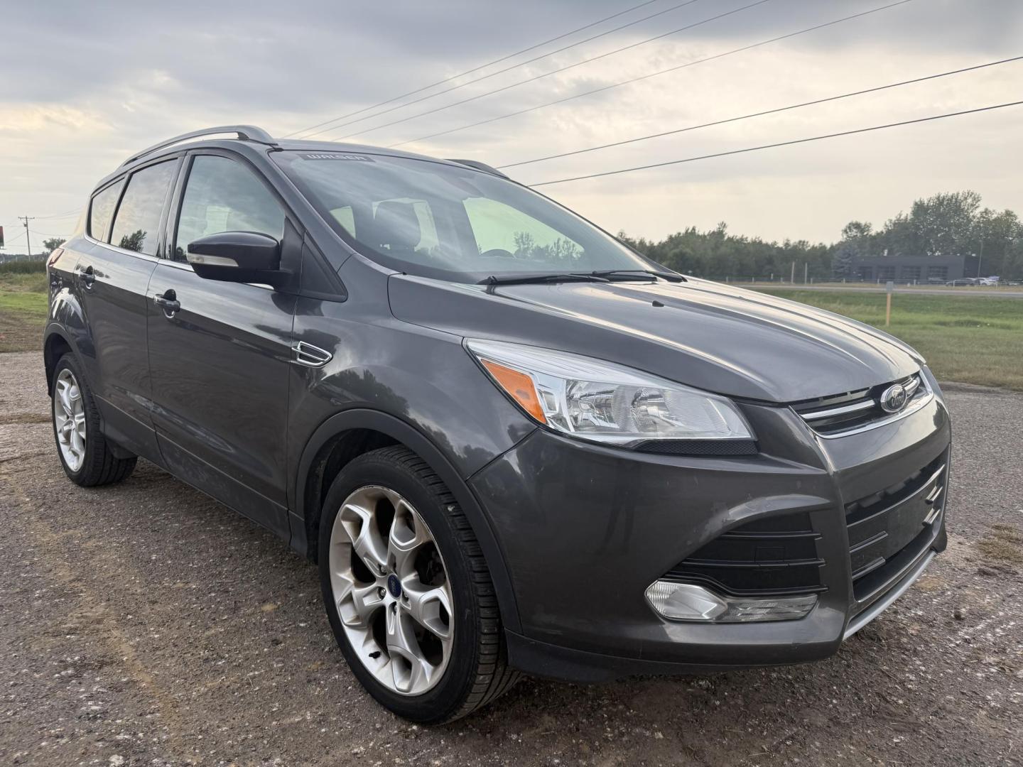 2015 Ford Escape Titanium 4WD (1FMCU9J94FU) with an 2.0L L4 DOHC 16V engine, 6-Speed Automatic transmission, located at 17255 hwy 65 NE, Ham Lake, MN, 55304, 0.000000, 0.000000 - Photo#6