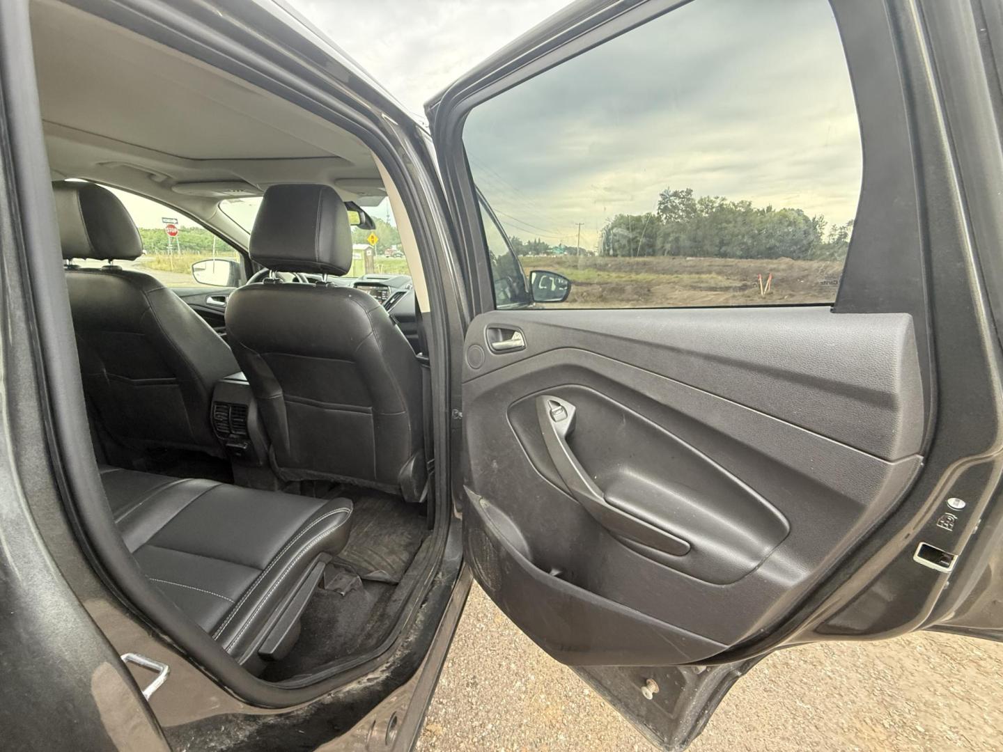 2015 Ford Escape Titanium 4WD (1FMCU9J94FU) with an 2.0L L4 DOHC 16V engine, 6-Speed Automatic transmission, located at 17255 hwy 65 NE, Ham Lake, MN, 55304, 0.000000, 0.000000 - Photo#12