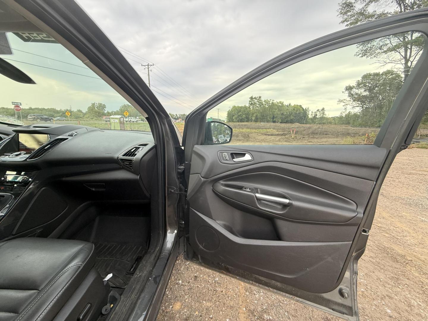 2015 Ford Escape Titanium 4WD (1FMCU9J94FU) with an 2.0L L4 DOHC 16V engine, 6-Speed Automatic transmission, located at 17255 hwy 65 NE, Ham Lake, MN, 55304, 0.000000, 0.000000 - Photo#14