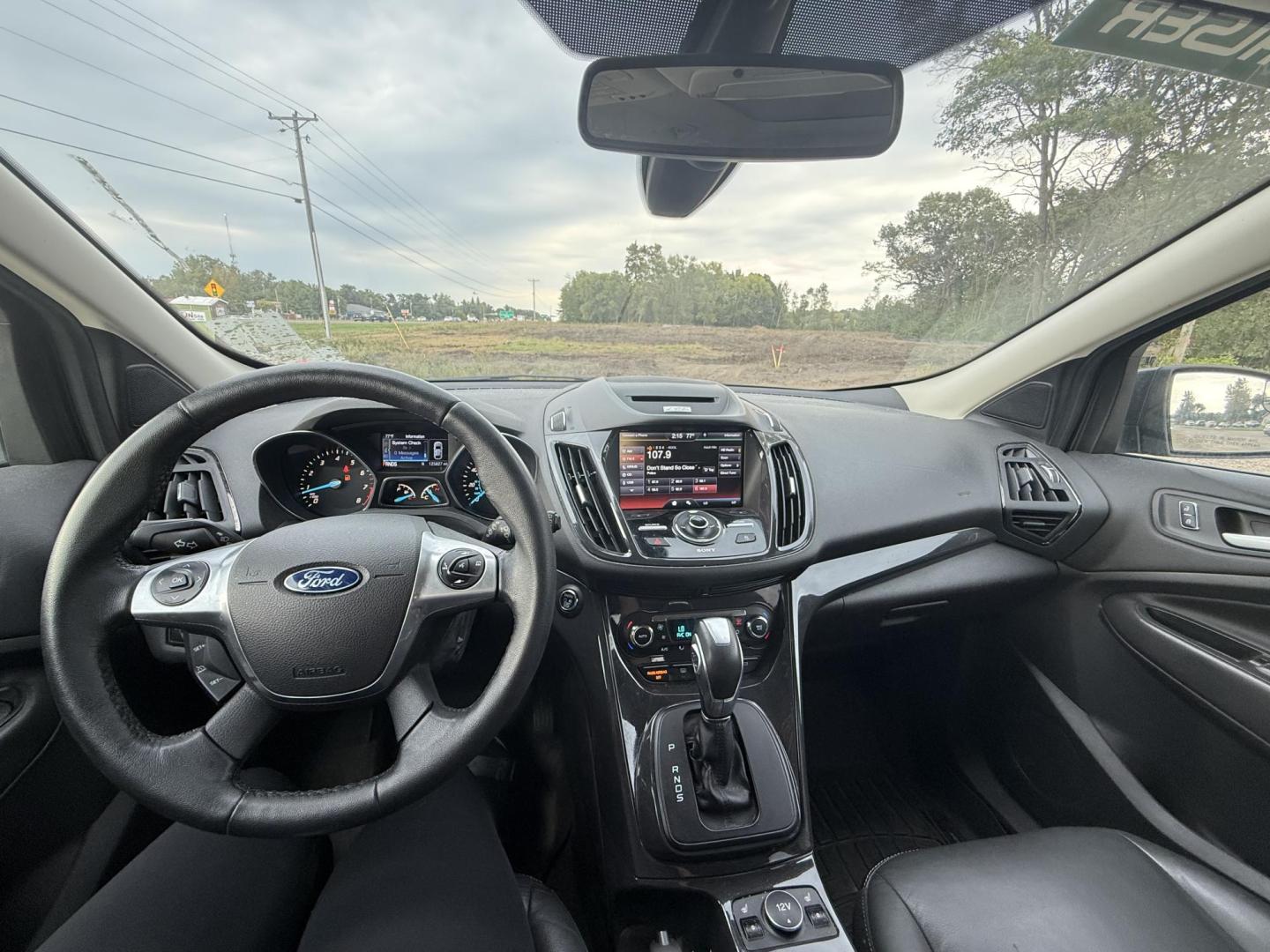 2015 Ford Escape Titanium 4WD (1FMCU9J94FU) with an 2.0L L4 DOHC 16V engine, 6-Speed Automatic transmission, located at 17255 hwy 65 NE, Ham Lake, MN, 55304, 0.000000, 0.000000 - Photo#16